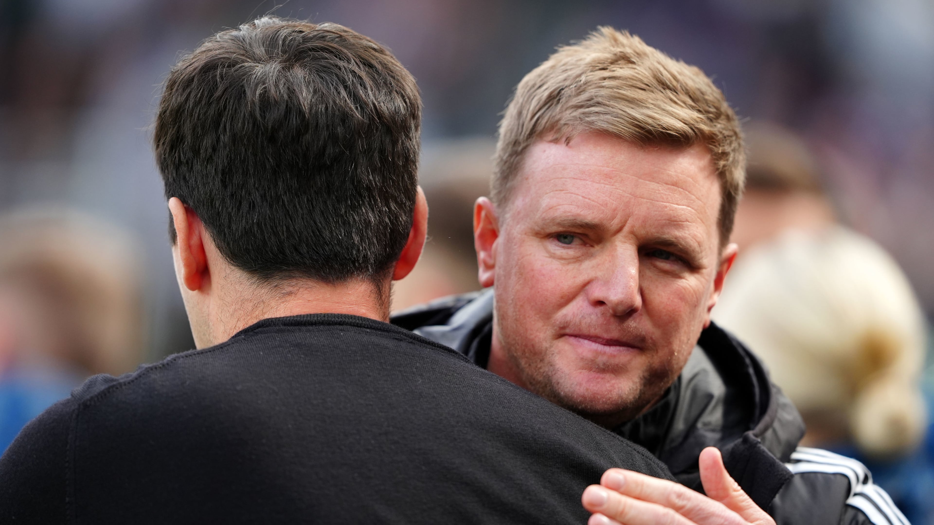 Bournemouth manager Andoni Iraola, left and Newcastle United manager Eddie Howe gesture, ahead of the English Premier League soccer match between Newcastle United and Bournemouth, in Newcastle, England, Saturday, April 18, 2026. (Owen Humphreys/PA via AP)