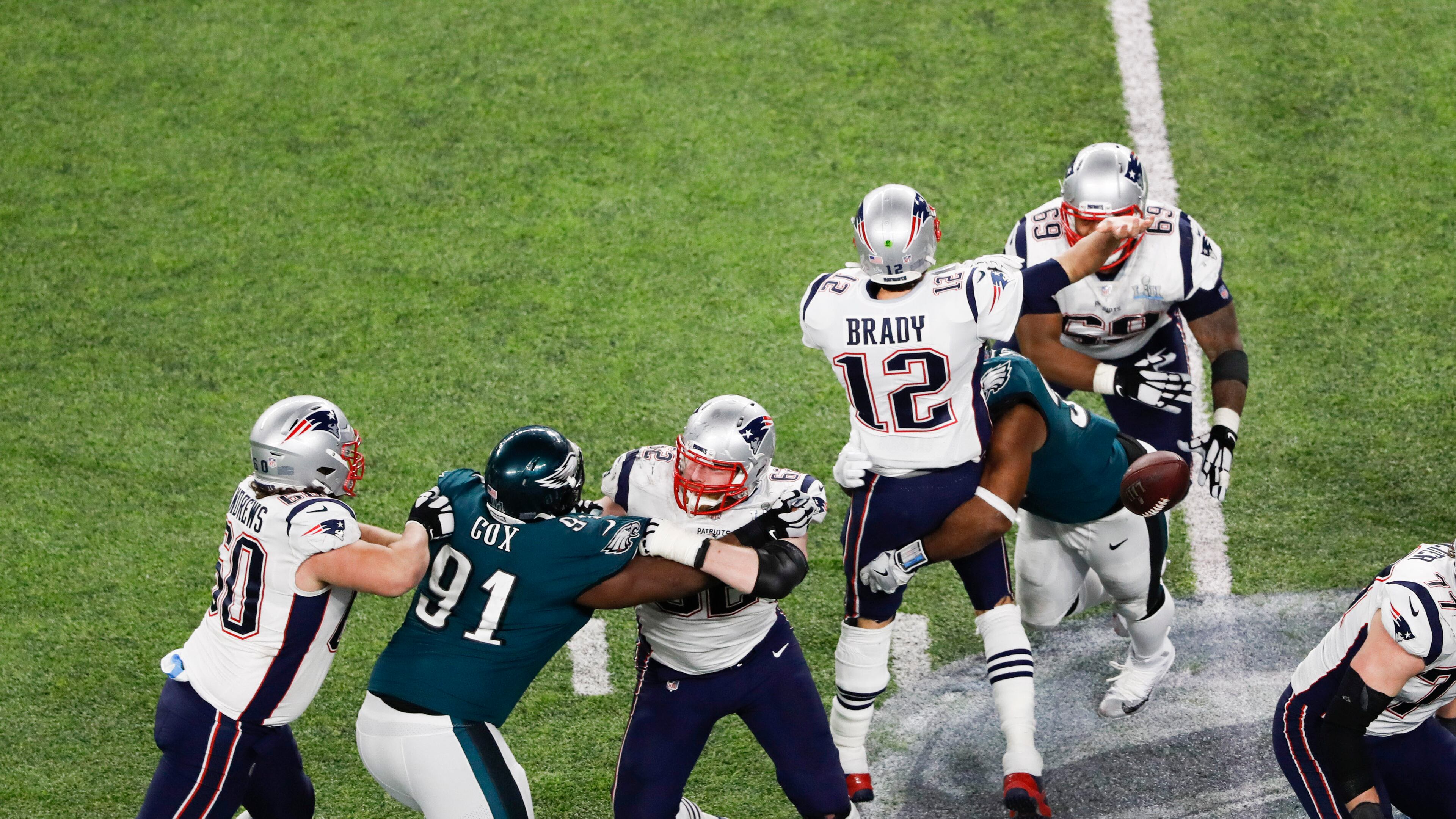 New England quarterback Tom Brady fumbles in the fourth quarter after being hit by Philadelphia’s Brandon Graham at U.S. Bank Stadium in Minneapolis. The fumble led to a field goal and a clinching field goal in the Eagles’ win.