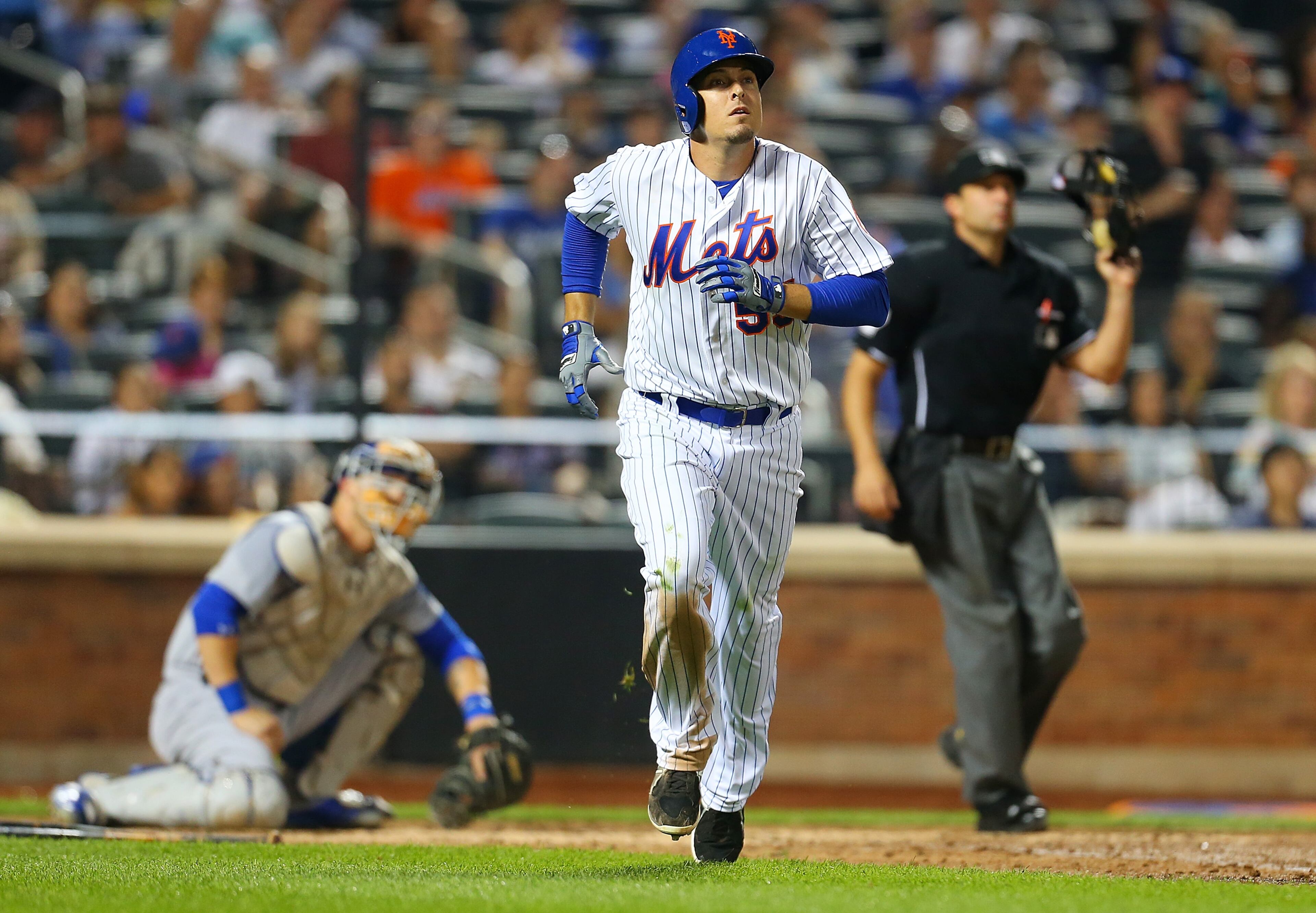 Kelly Johnson #55 of the New York Mets connects on a solo home run in the fifth inning against the Los Angeles Dodgers at Citi Field on July 25, 2015 in Flushing neighborhood of the Queens borough of New York City. (Photo by Mike Stobe/Getty Images)