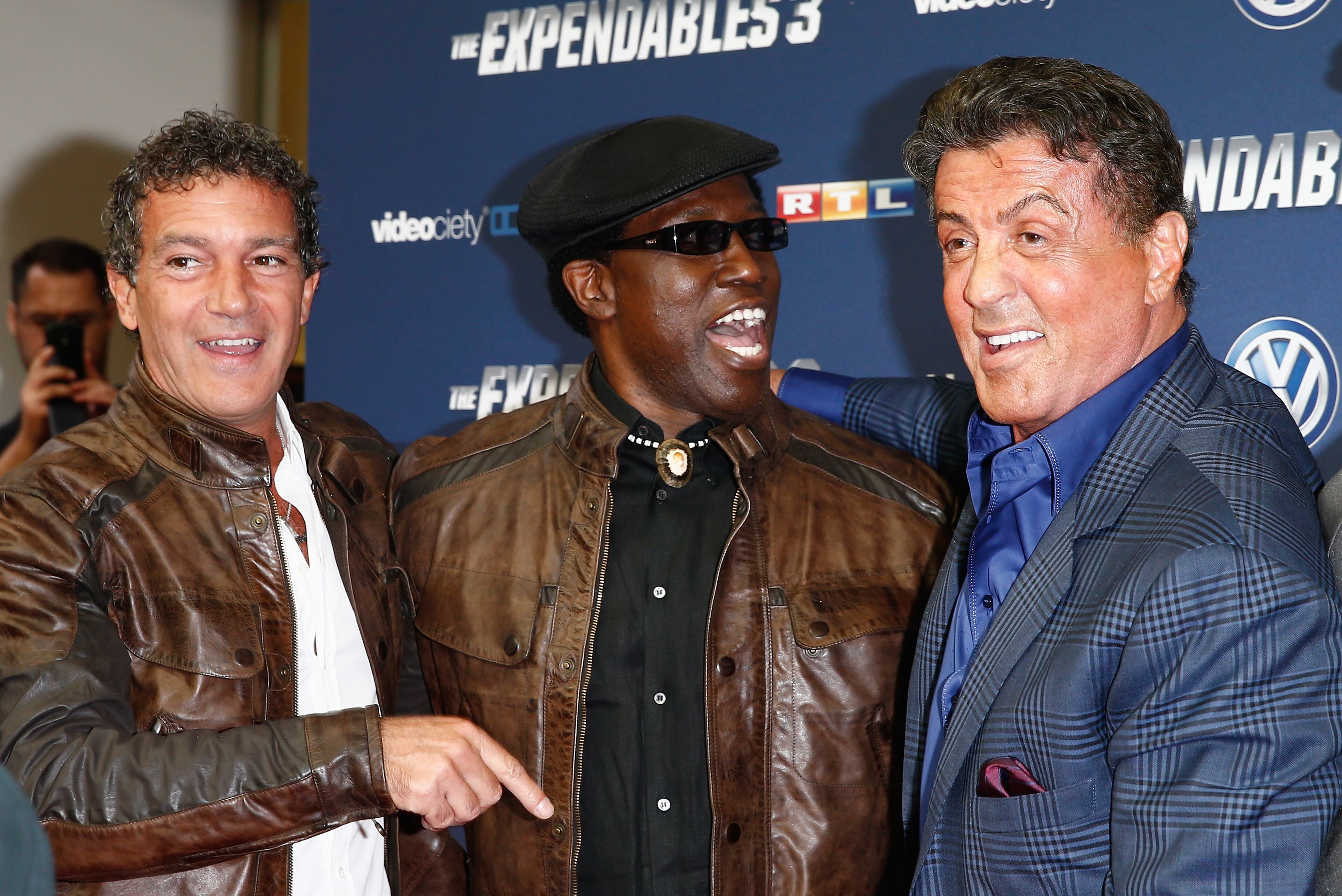 COLOGNE, GERMANY - AUGUST 06: (L-R) Antonio Banderas, Wesley Snipes and Sylvester Stallone attend the German premiere of the film 'The Expendables 3' at Residenz Kino on August 6, 2014 in Cologne, Germany. (Photo by Andreas Rentz/Getty Images)