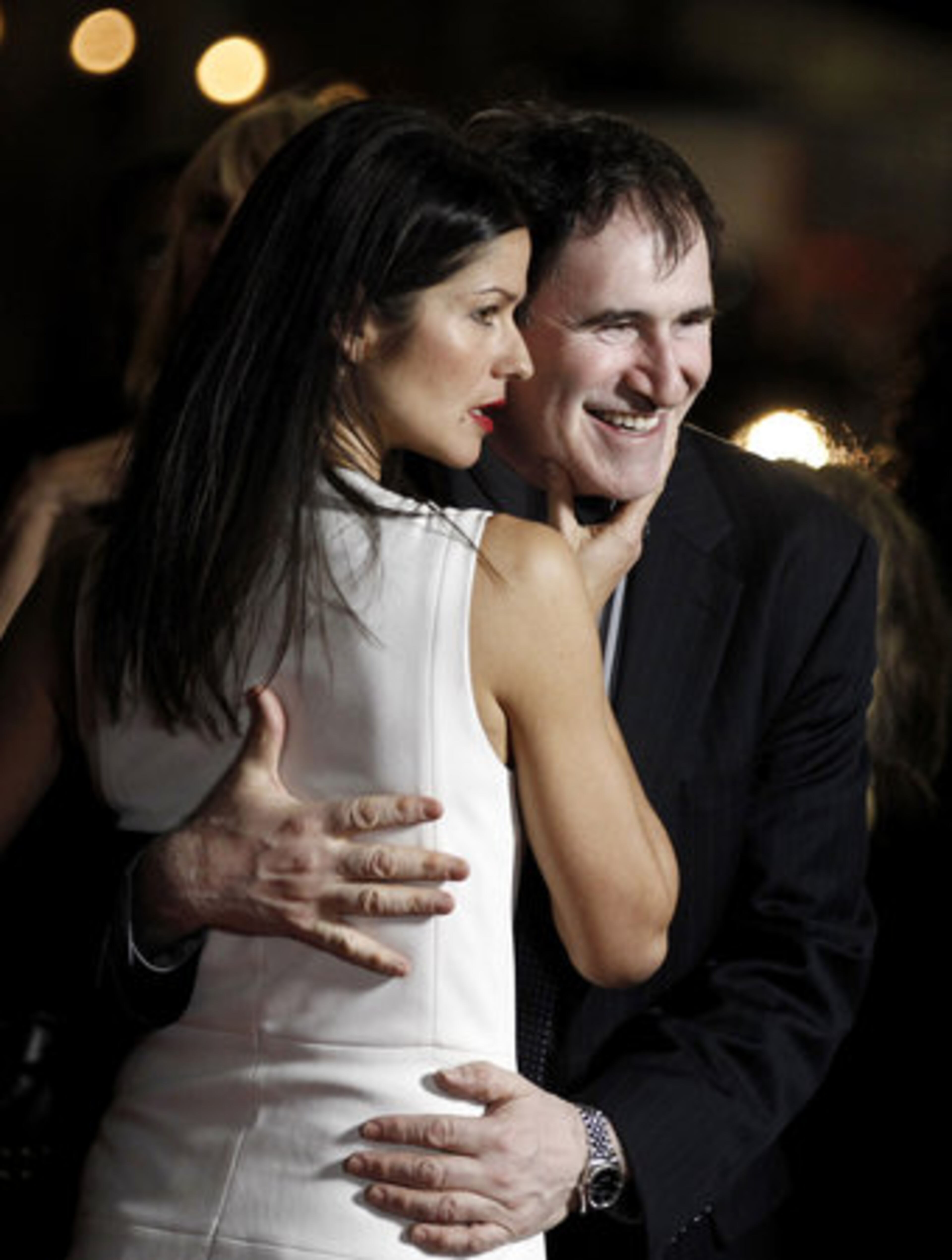 Hennessy looks as though she's going to get lucky with co-star Richard Kind at the "Luck" premiere.