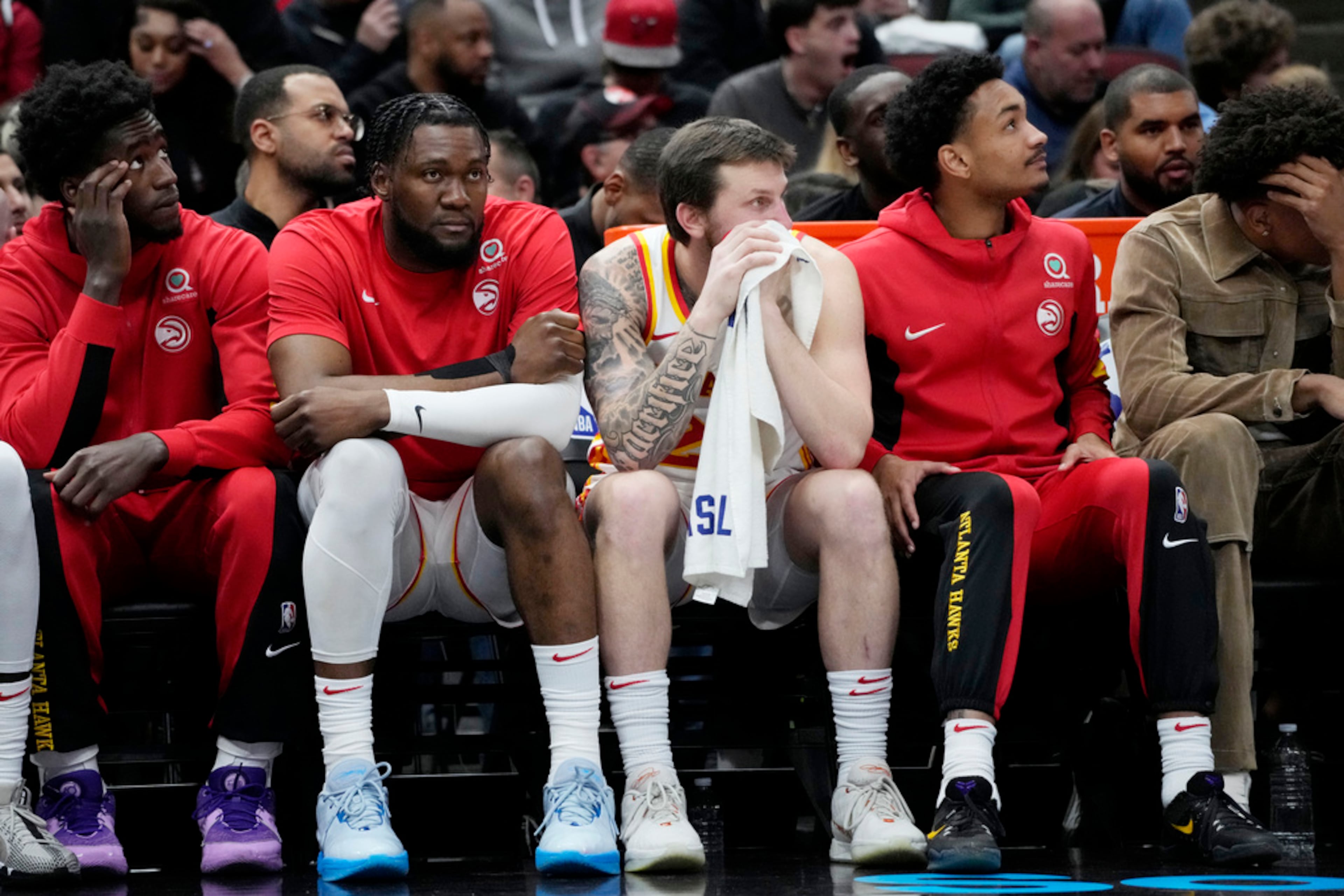 Atlanta Hawks players sit on the bench during the second half of the team's NBA basketball play-in tournament game against the Chicago Bulls in Chicago, Wednesday, April 17, 2024. The Bulls won 131-116. (AP Photo/Nam Y. Huh)