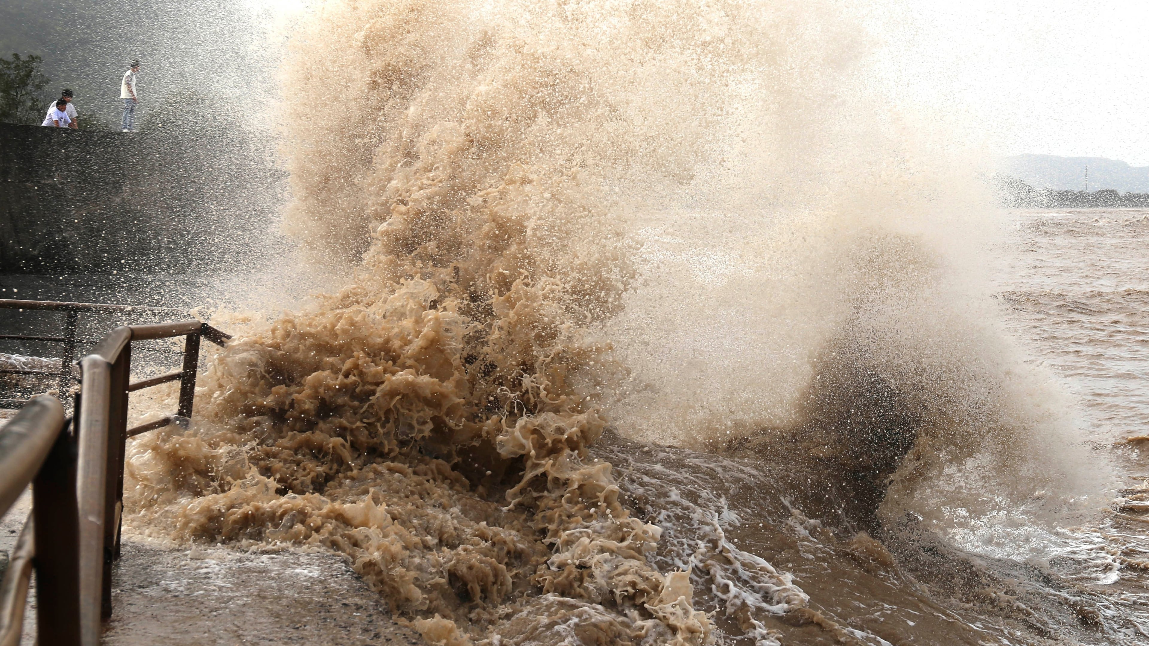 Huge waves crash on the coastline ahead of Typhoon Bavi in Wenling in eastern China's Zhejiang province, Friday, July 10, 2026. (Chinatopix Via AP) CHINA OUT