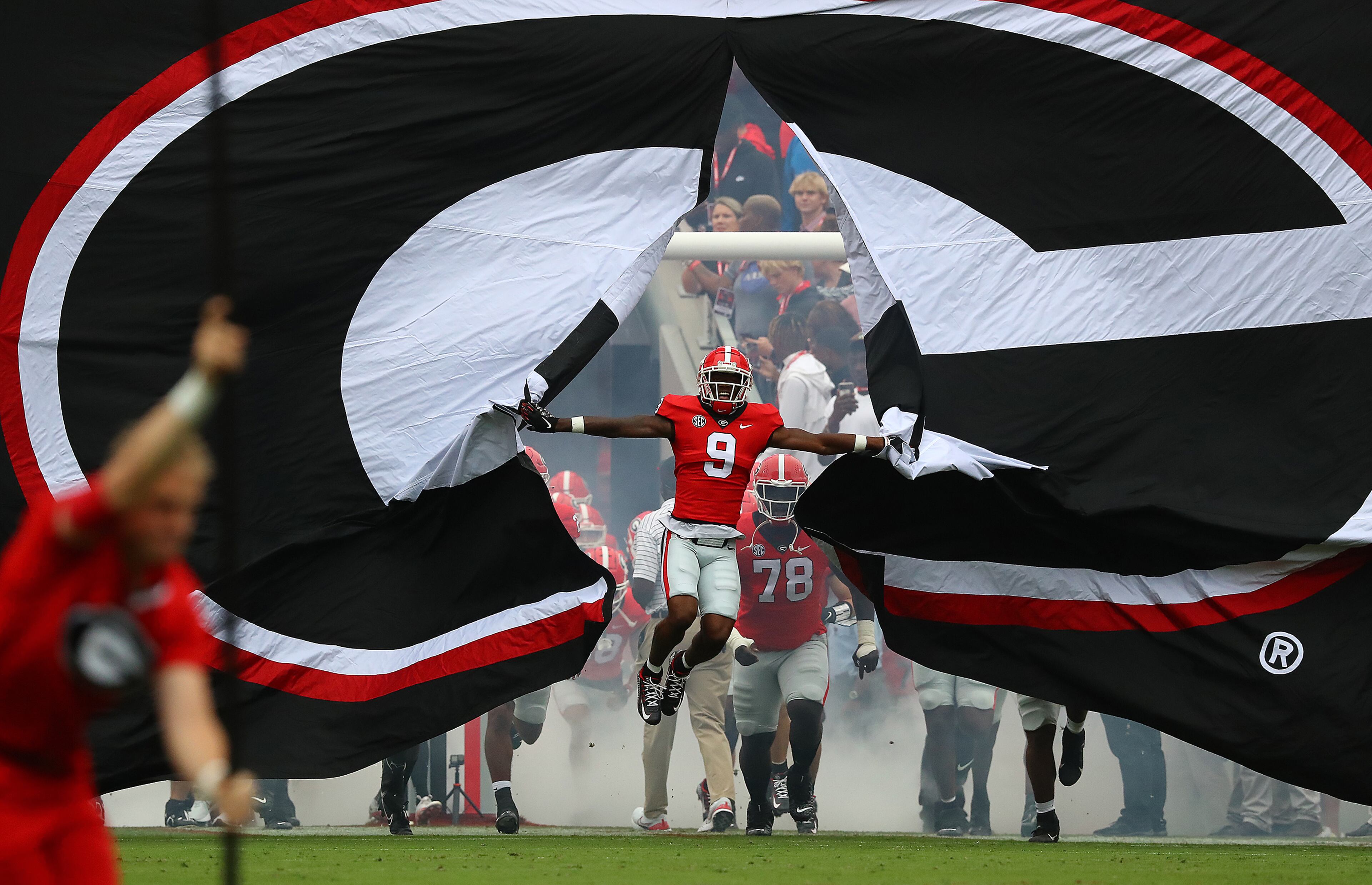 Georgia wide receiver Jackson Meeks breaks through the banner as Georgia takes the field for the home opener against Samford in a NCAA college football game on Saturday, Sept. 10, 2022, in Athens. “Curtis Compton / Curtis Compton@ajc.com