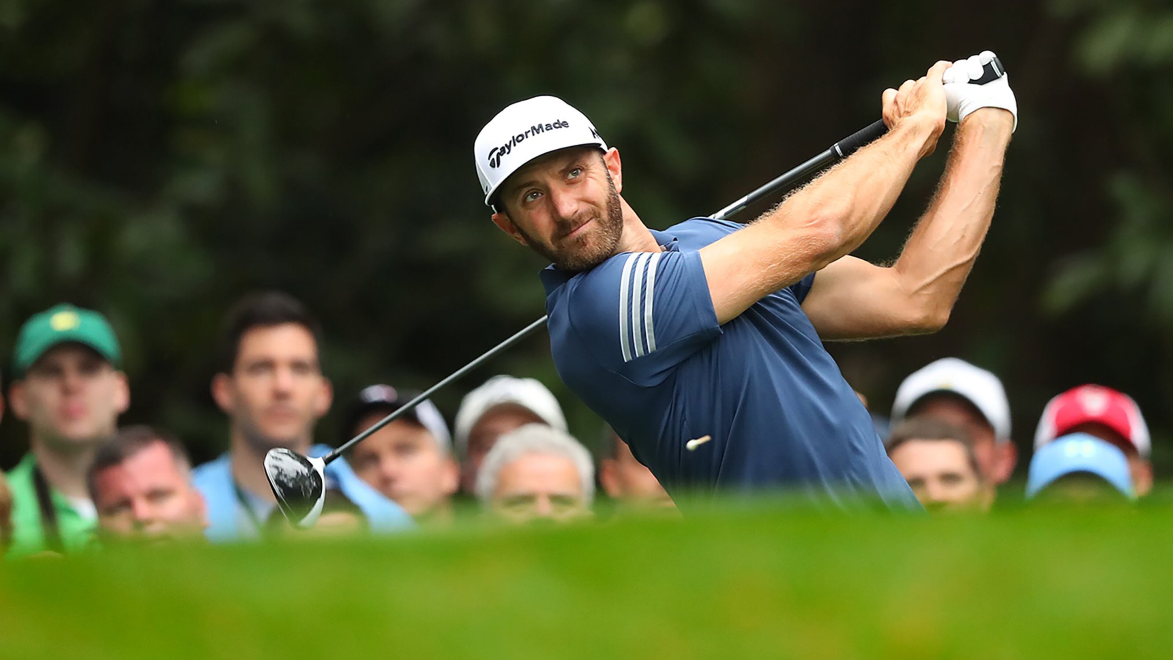 Dustin Johnson tees off on the 11th hole during his practice round for the Masters at Augusta National Golf Club on Monday, April 3, 2017, in Augusta. Curtis Compton/ccompton@ajc.com