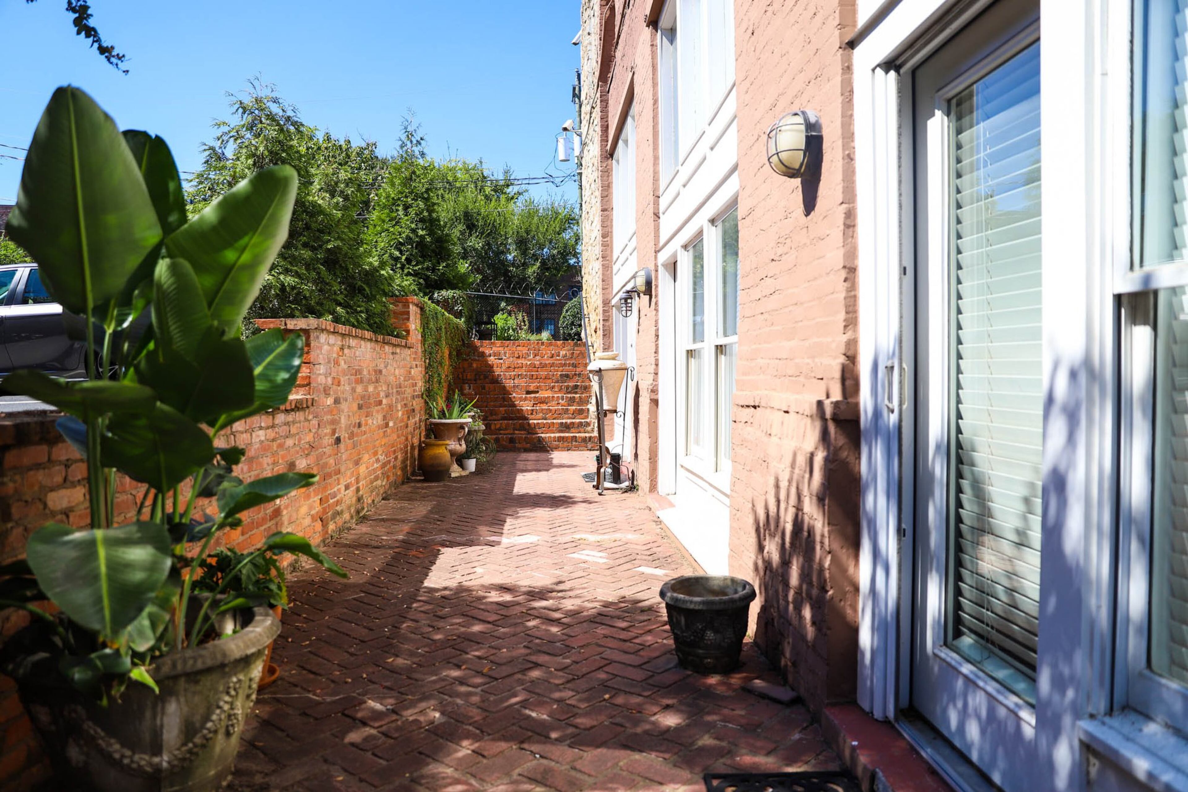 Kevin and Diana Sheldon bought their 1,600-square-foot loft in 2017 after deciding to downsize twice, first from a six bedroom home and then from a townhome in Haynes Park to their current loft. The loft was built in 1989 and has an open industrial feel. Text by Shannon Dominy. Photo by Reynolds Rogers.