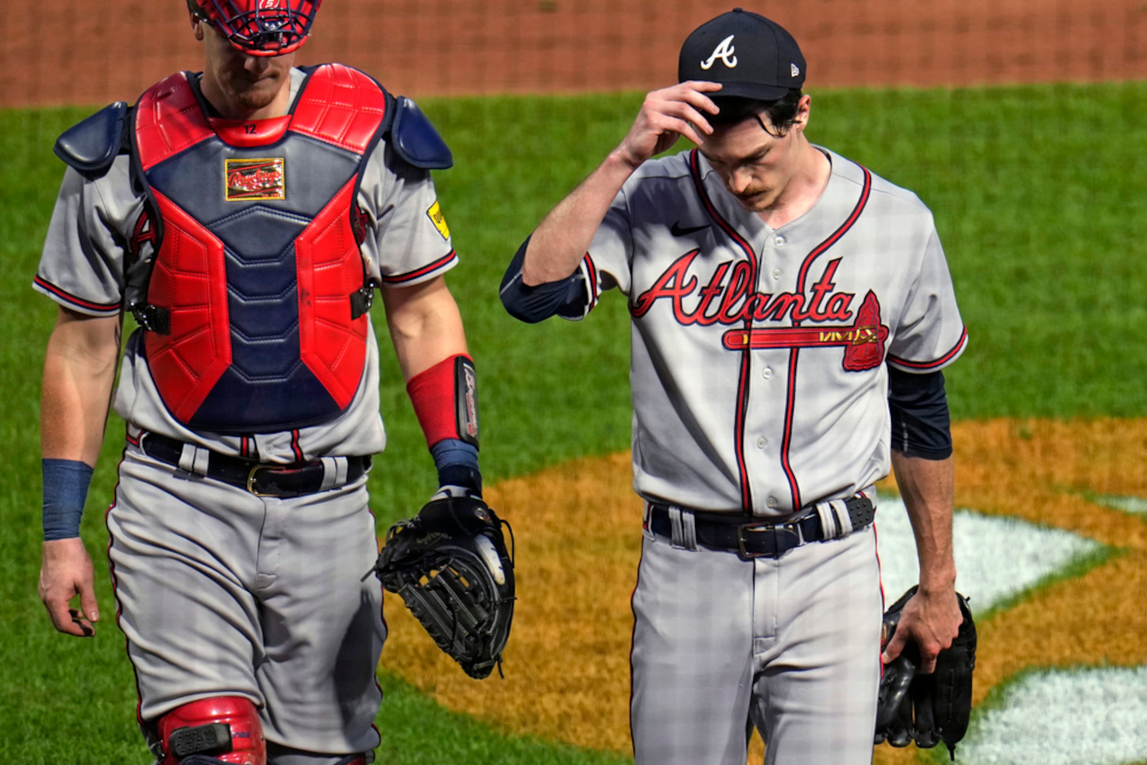 Atlanta Braves starting pitcher Max Fried, right, walks to the dugout with catcher Sean Murphy after the fourth inning of the team's baseball game against the Pittsburgh Pirates in Pittsburgh, Wednesday, Aug. 9, 2023. (AP Photo/Gene J. Puskar)