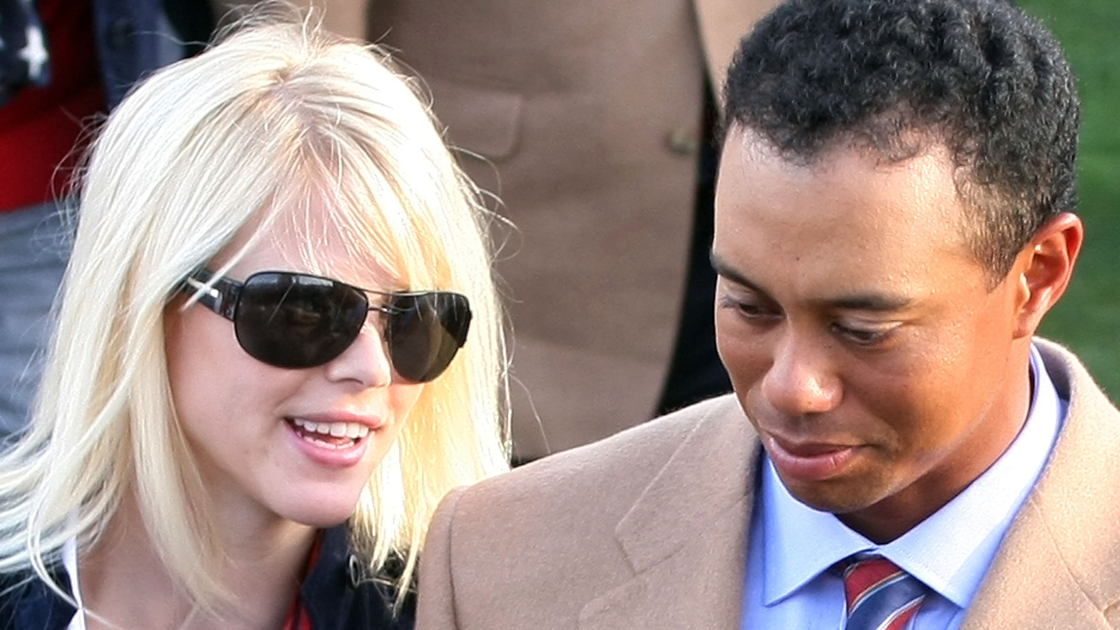 MONTREAL, QC - SEPTEMBER 26: Tiger Woods of the U.S. Team walks with his wife Elin Woods during the opening ceremonies prior to the start of The Presidents Cup at The Royal Montreal Golf Club on September 26, 2007 in Montreal, Quebec, Canada. (Photo by Scott Halleran/Getty Images)