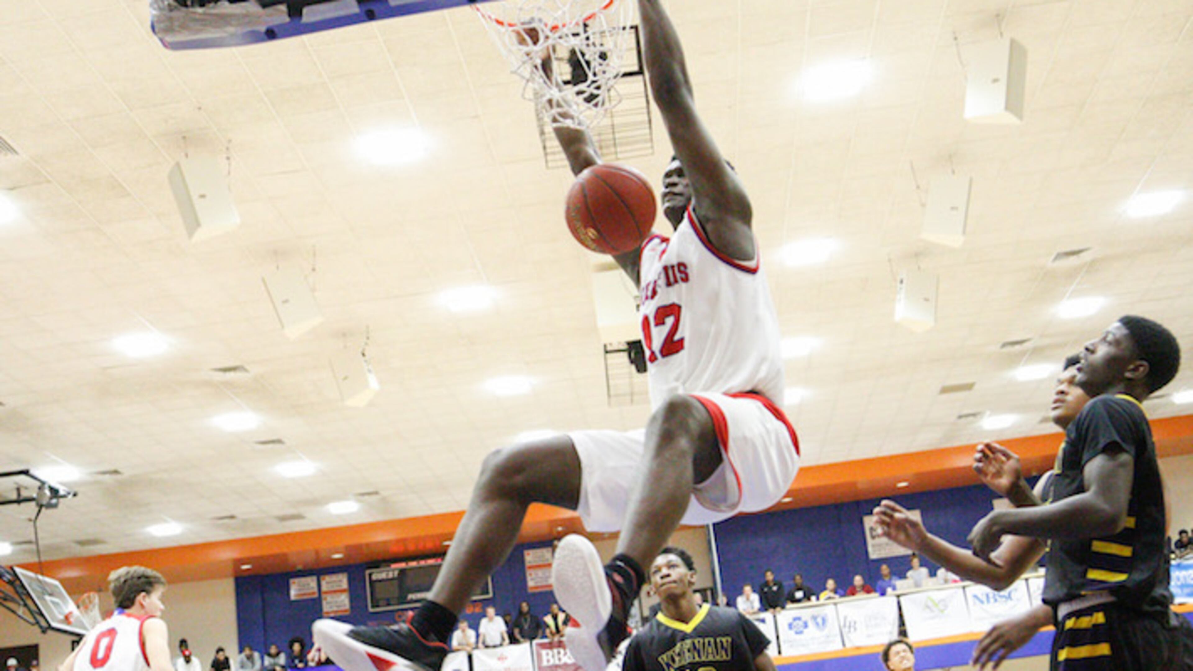 Spartanburg Day's Zion Williamson (12) makes a dunk while playing Keenan during the Chick-fil-A Classic at Richland Northeast High School on Dec. 22, 2016. (Tracy Glantz/The State/TNS)