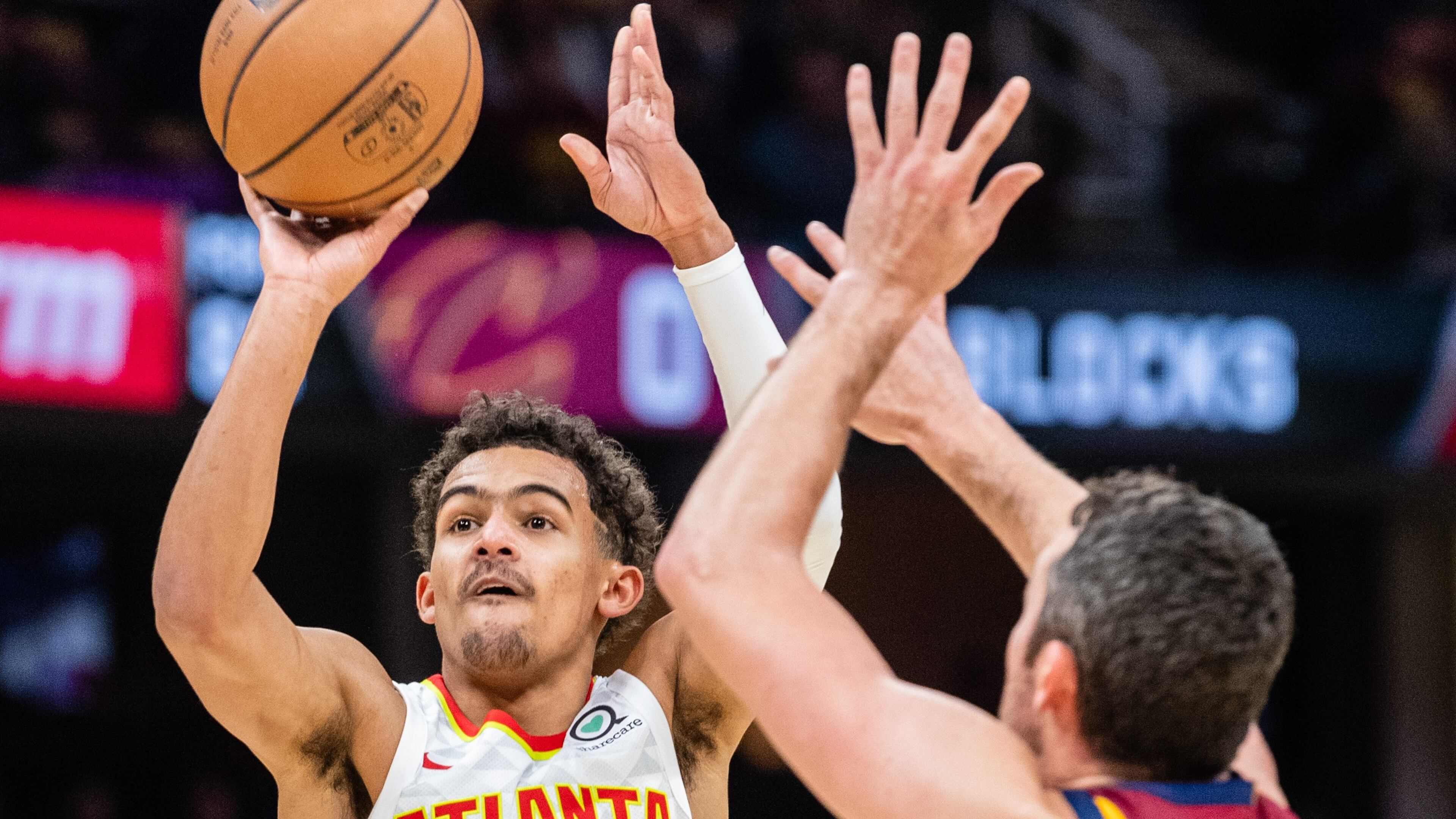 Trae Young of the Atlanta Hawks shoots over Kevin Love of the Cleveland Cavaliers during the second quarter at Quicken Loans Arena on October 21, 2018 in Cleveland, Ohio. (Photo by Jason Miller/Getty Images)