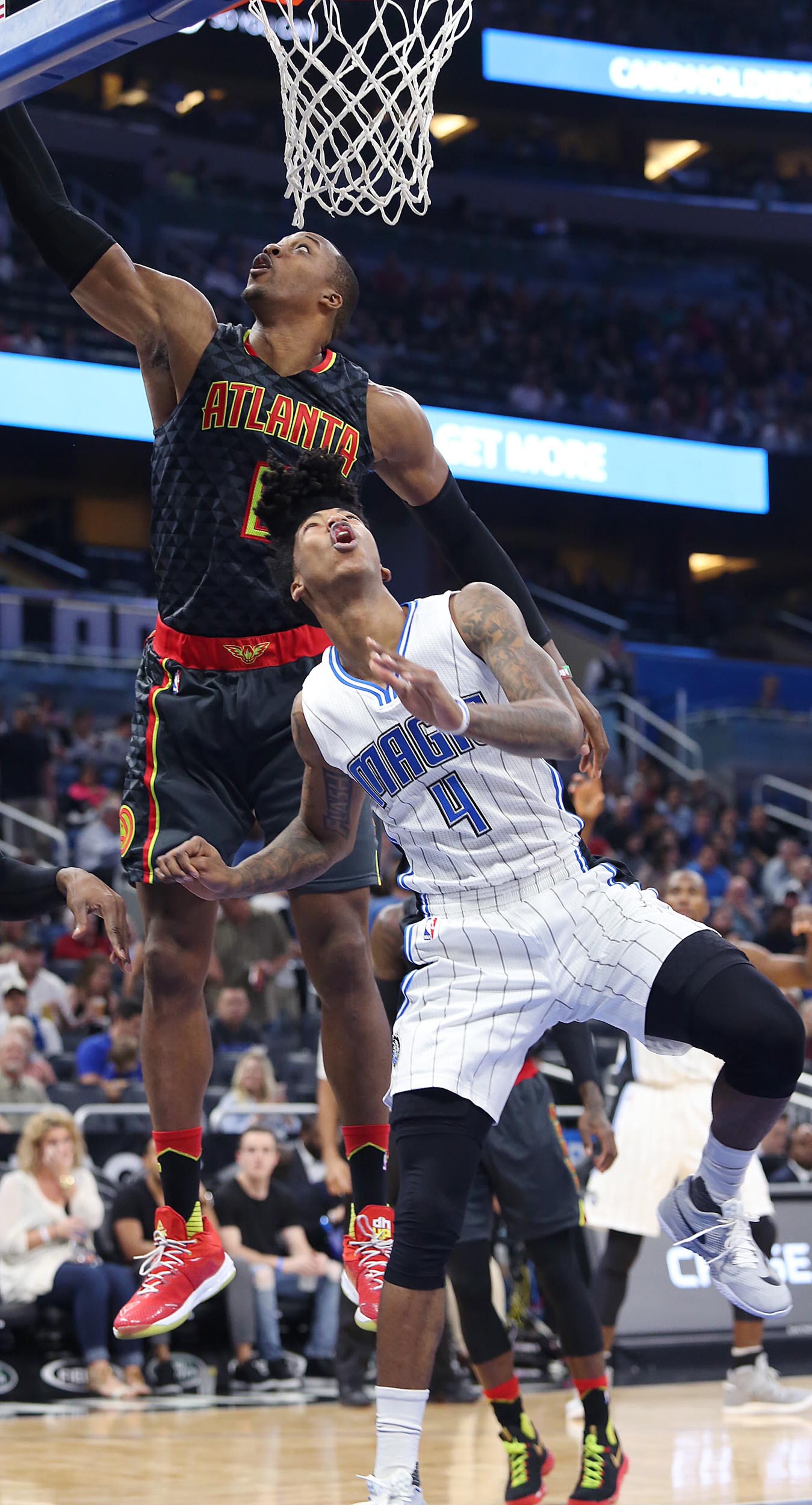The Atlanta Hawks' Dwight Howard towers over the Orlando Magic's Elfrid Payton (4) during the first half at the Amway Center in Orlando, Fla., on Wednesday, Jan. 4, 2017. (Stephen M. Dowell/Orlando Sentinel/TNS)