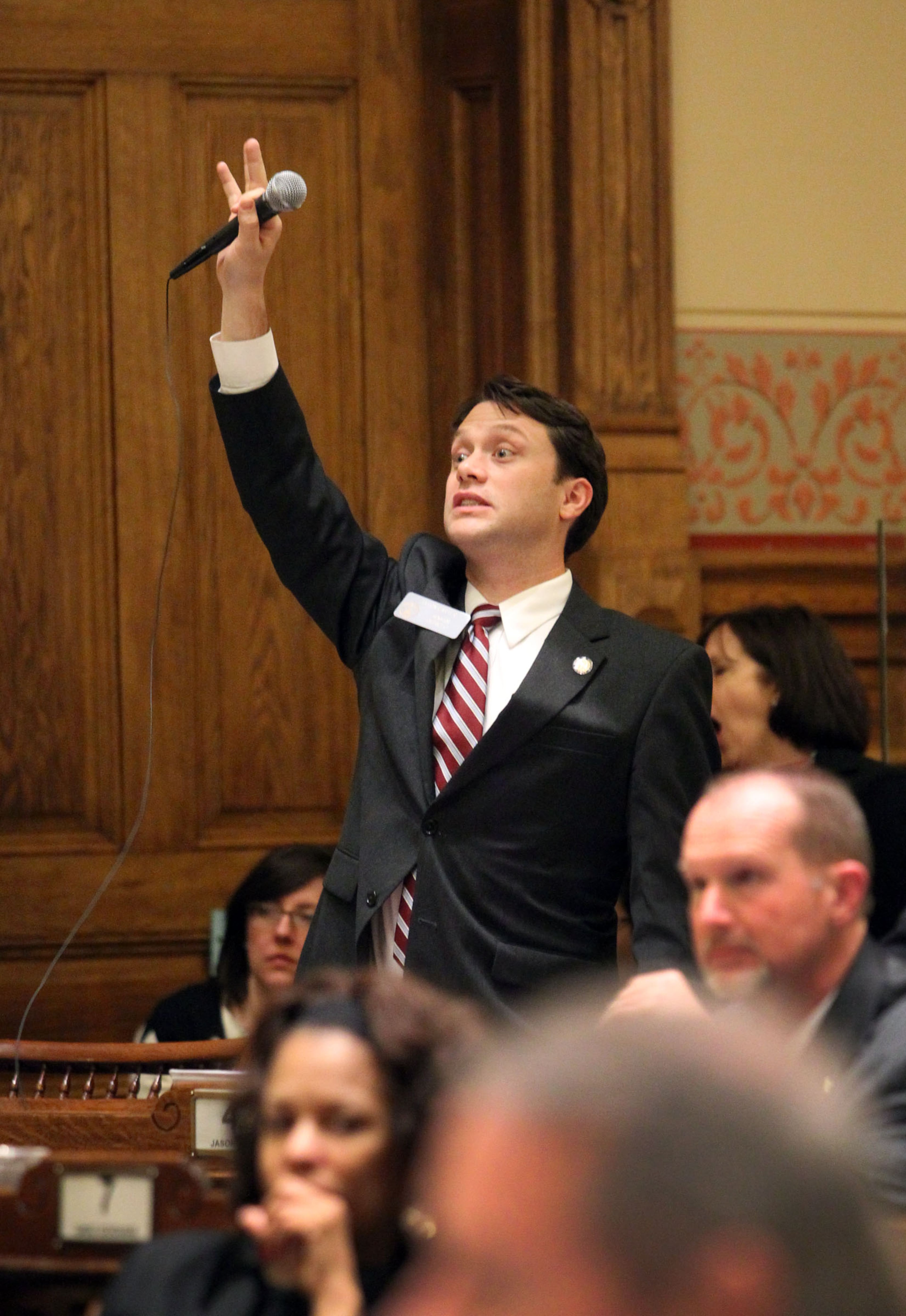 Sen. Jason Carter, D-Decatur, tries to get the attention of Lt. Gov. Casey Cagle after the Senate Democrats were unable to speak against Senate Bill 469 before it was voted on during Crossover Day at the State Capitol on March 7, 2012.