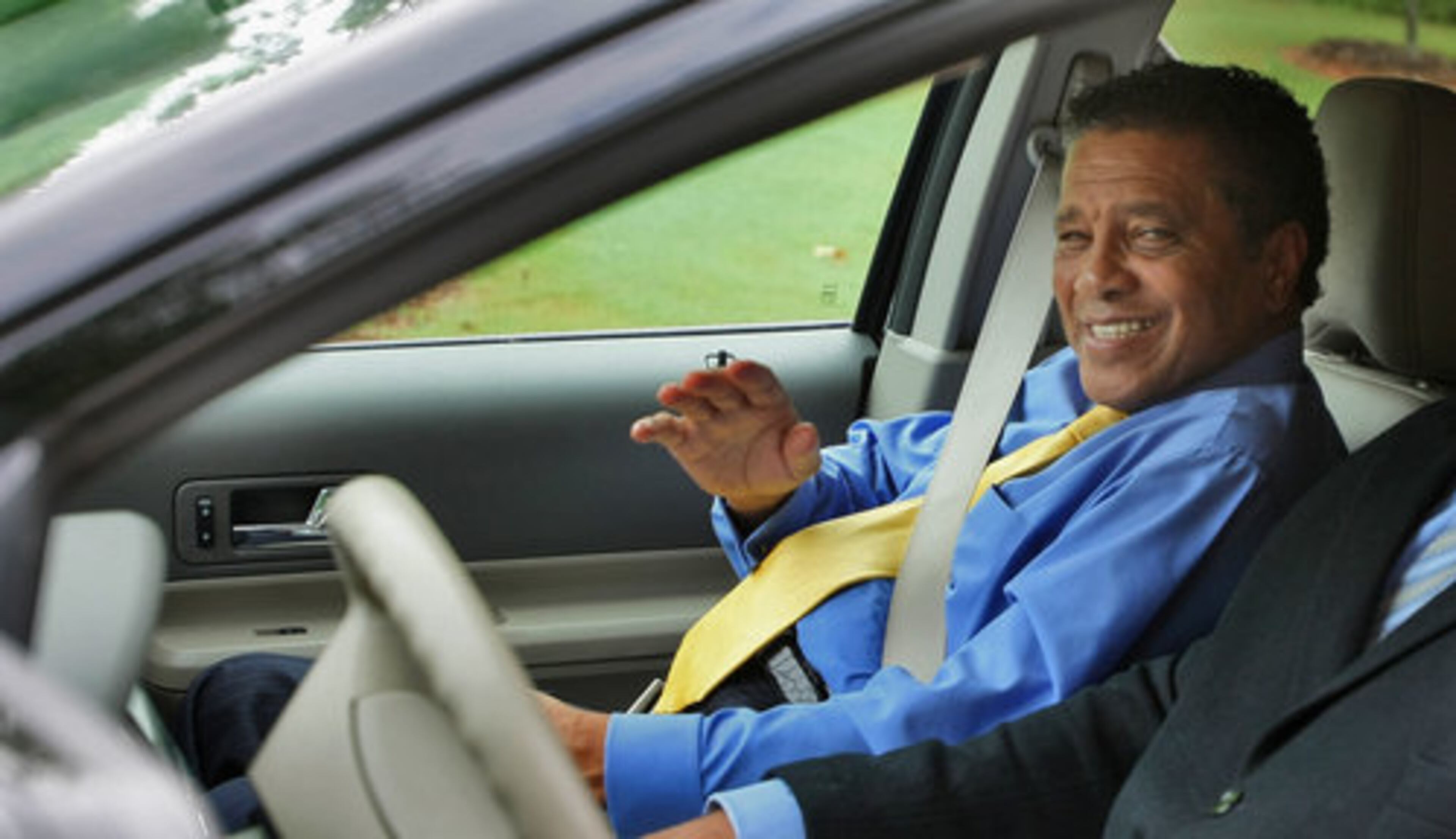 Clayton County Commission chair Eldrin Bell smiles as he arrives Thursday.