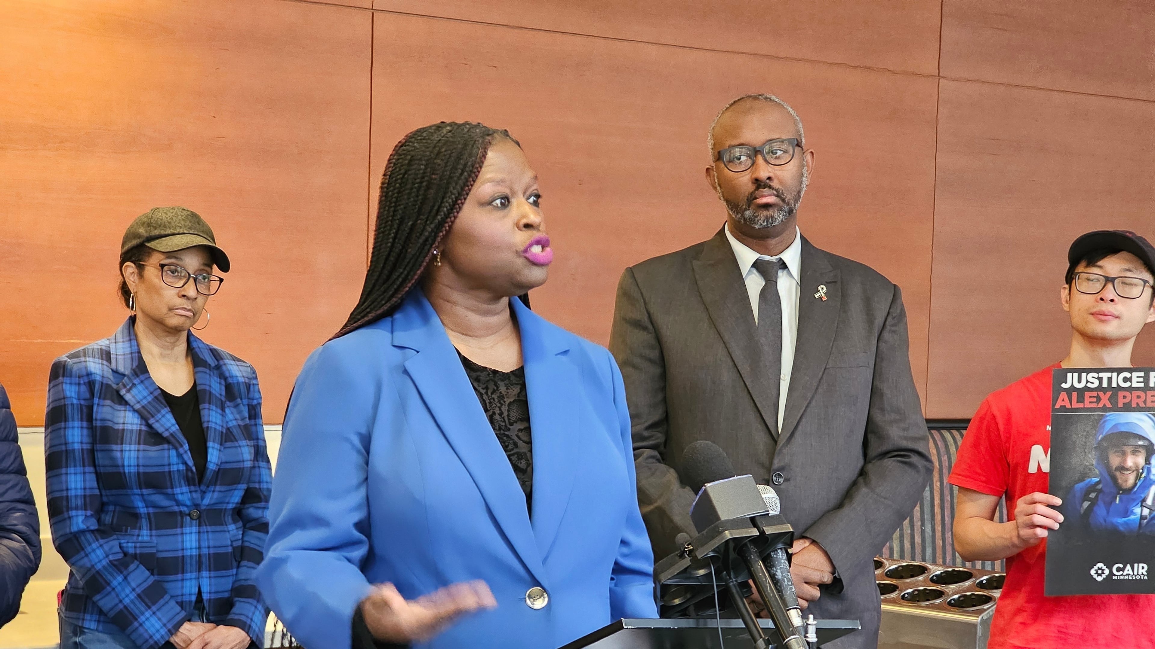 Minnesota civil rights activist Nekima Levy Armstrong, center left, and Jaylani Hussein, executive director of the Minnesota chapter of the Council on Islamic-American Relations, speak at a news conference in Minneapolis on Friday, March 6, 2026, on the ouster of Kristi Noem as secretary of the Department of Homeland Security. (AP Photo/Steve Karnowski)