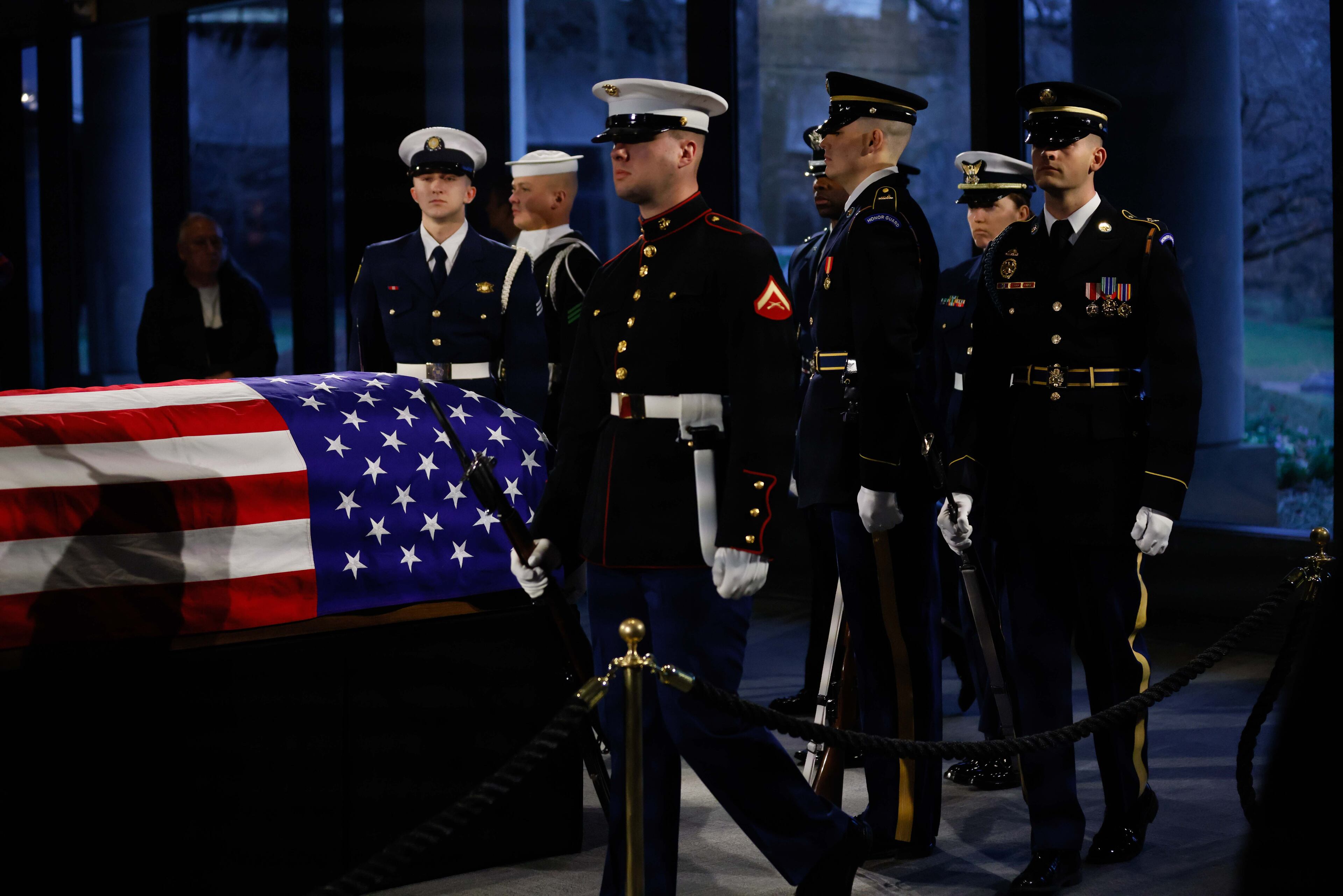 The Honor Guard takes a shift change as former President Jimmy Carter’s flag-draped casket lies in repose at the Jimmy Carter Presidential Library and Museum in Atlanta on Monday, January 6, 2025. Carter died peacefully at 100 in Plains, Georgia, on December 29, 2024.
(Miguel Martinez/AJC)