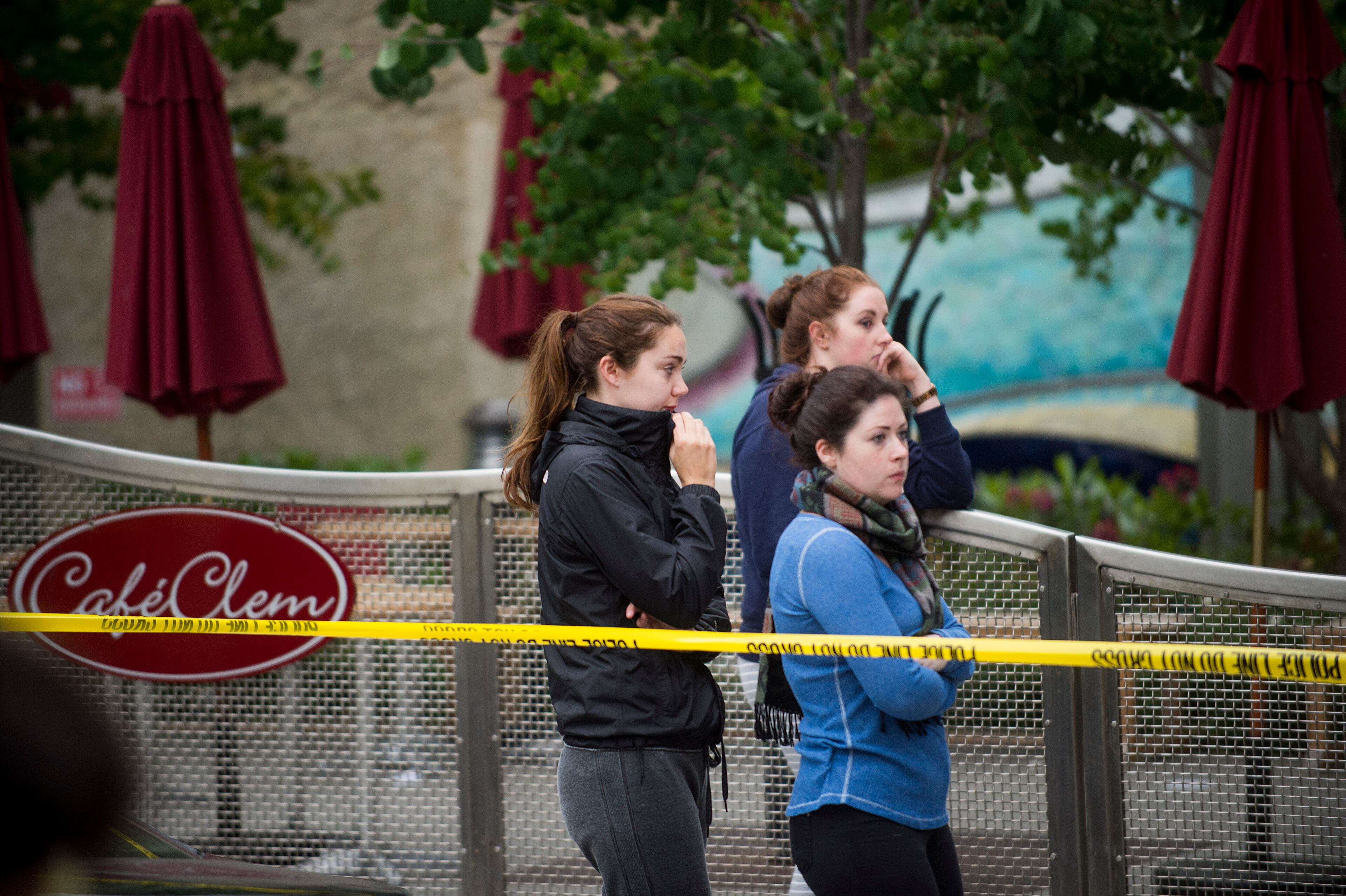 People gather at the scene of a balcony collapse in Berkeley, Calif. on Tuesday, June 16, 2015. Berkeley police say several people are dead and others injured after a balcony fell shortly before 1 a.m., near the University of California, Berkeley. (AP Photo/Noah Berger)