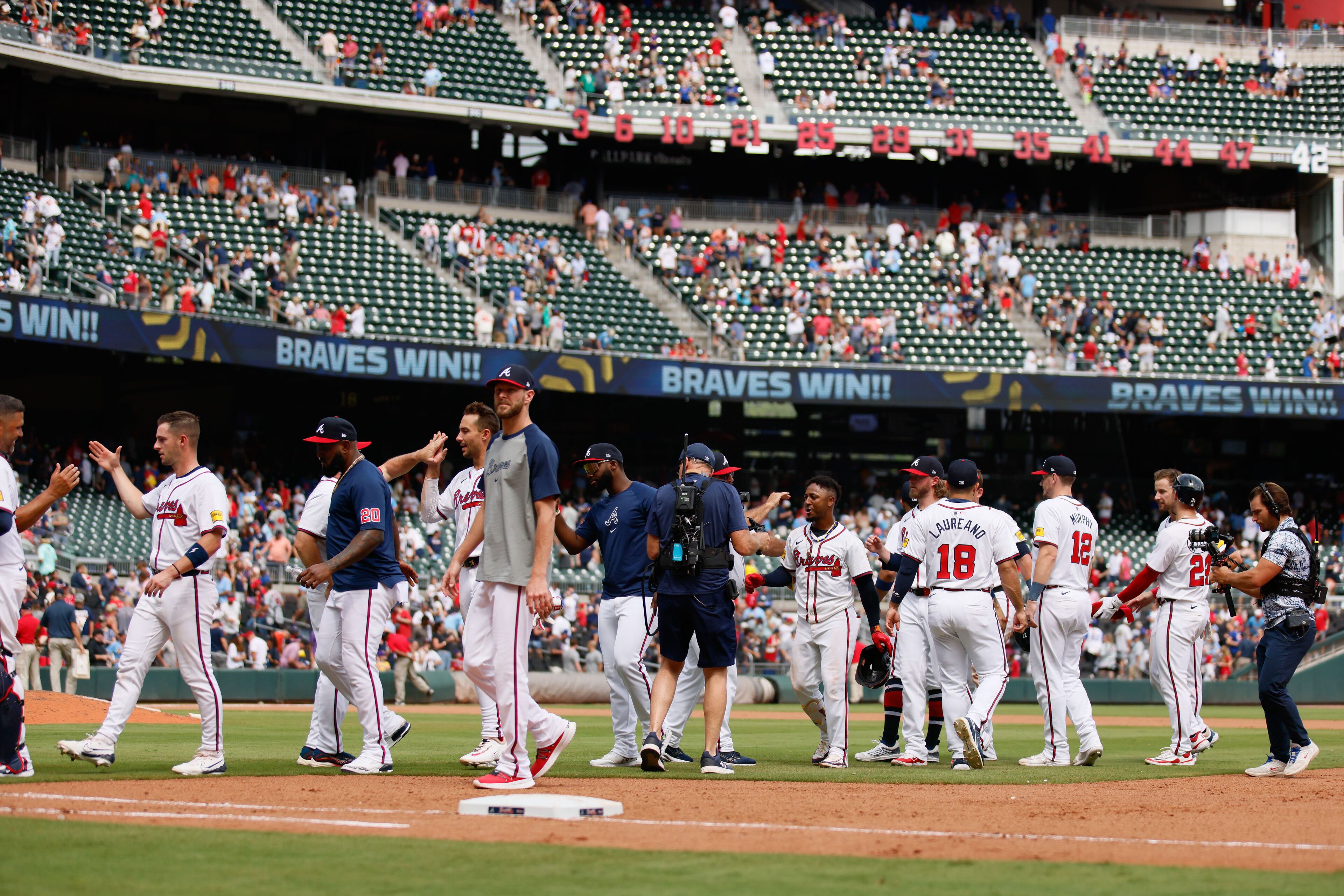 Atlanta Braves players celebrate after derfeating the St. Louis Cardinals 3-2 at Truist Park on Saturday, July 20, 2024, in Atlanta.
(Miguel Martinez/ AJC)