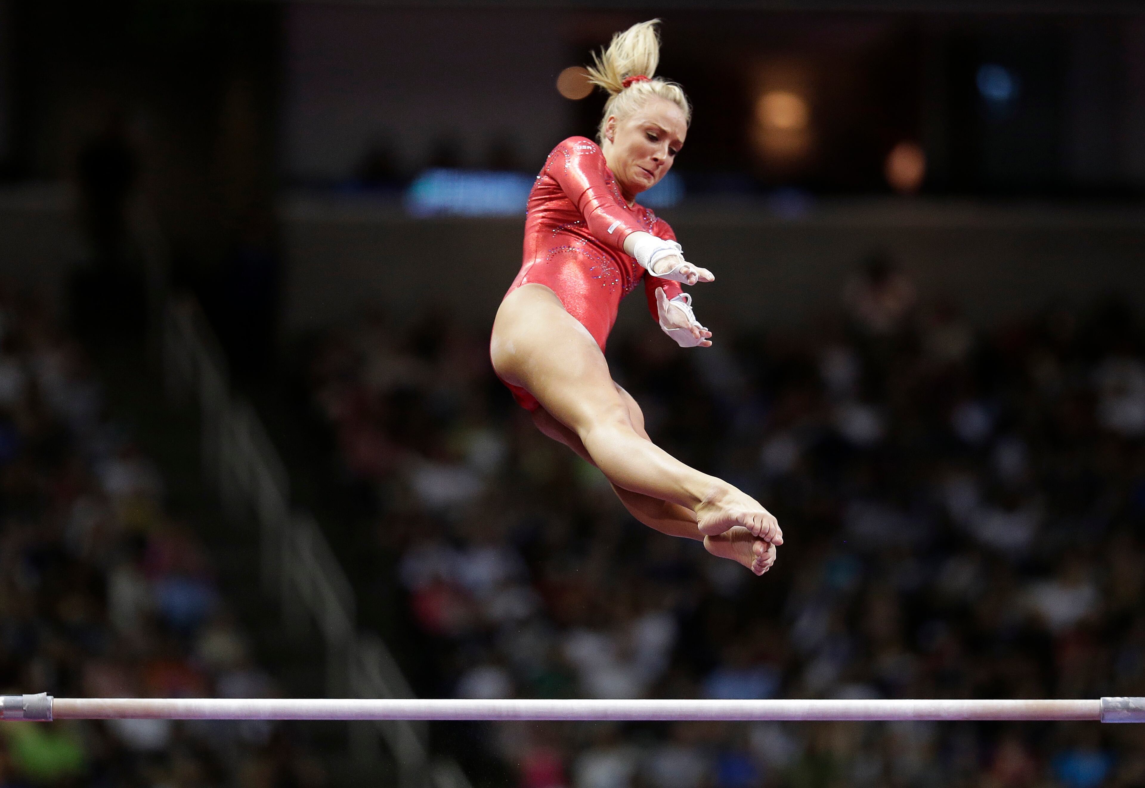 Nastia Liukin performs on the uneven bars during the final round of the women's Olympic gymnastics trials, Sunday, July 1, 2012, in San Jose, Calif. (AP Photo/Jae C. Hong)