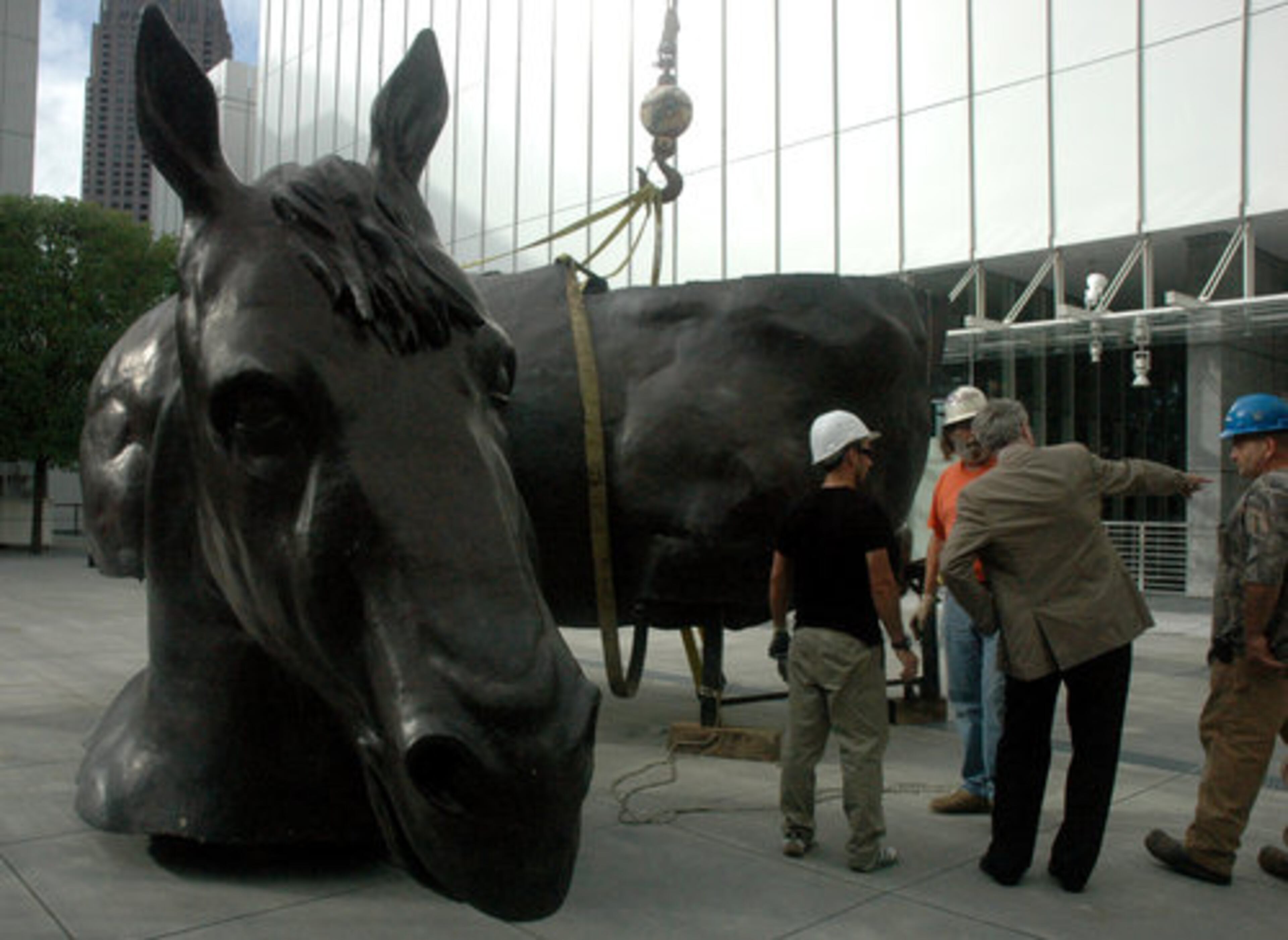 Exhibition Curator Gary Radke, center, discussed the Sforza horse with crew members at the High Museum.
