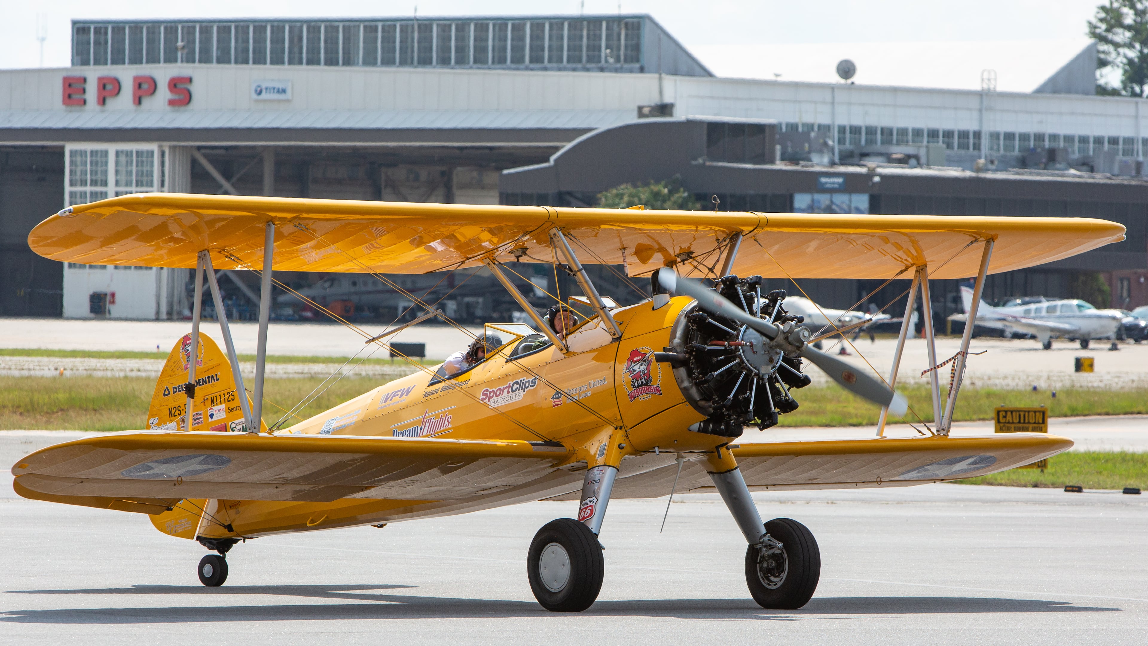 Ninety-eight-year-old World War II veteran Ken Will & Pilot John P. Cyrier taxi after a ride in a 1943 Boeing Stearman bi-plane at PDK Airport. PHIL SKINNER FOR THE ATLANTA JOURNAL-CONSTITUTION.