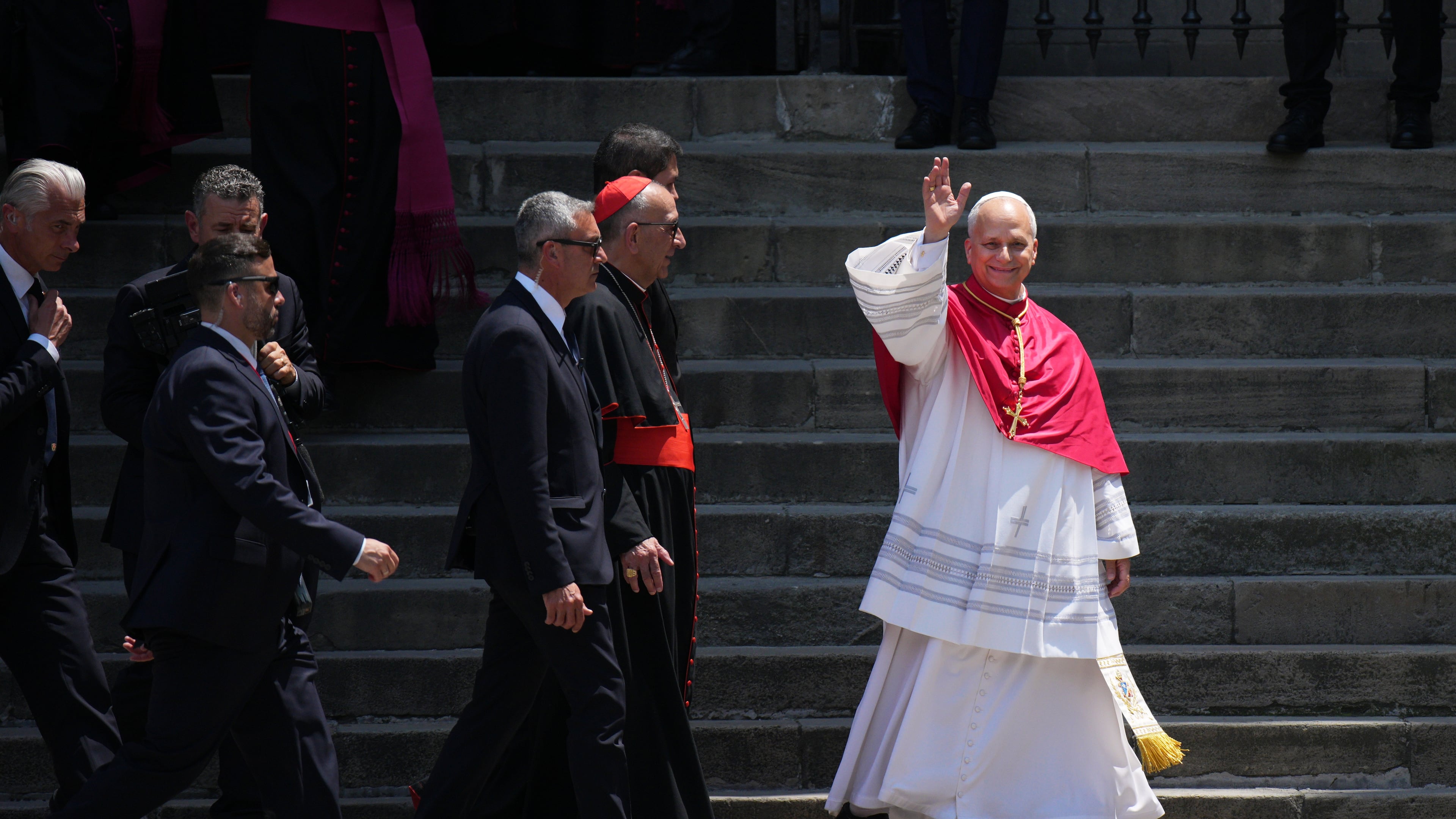 Pope Leo XIV waves to the cheering crowd after attending a midday prayer at the Cathedral of the Holy Cross and Saint Eulalia in Barcelona, Spain, Tuesday, June 9, 2026. (AP Photo/Emilio Morenatti)