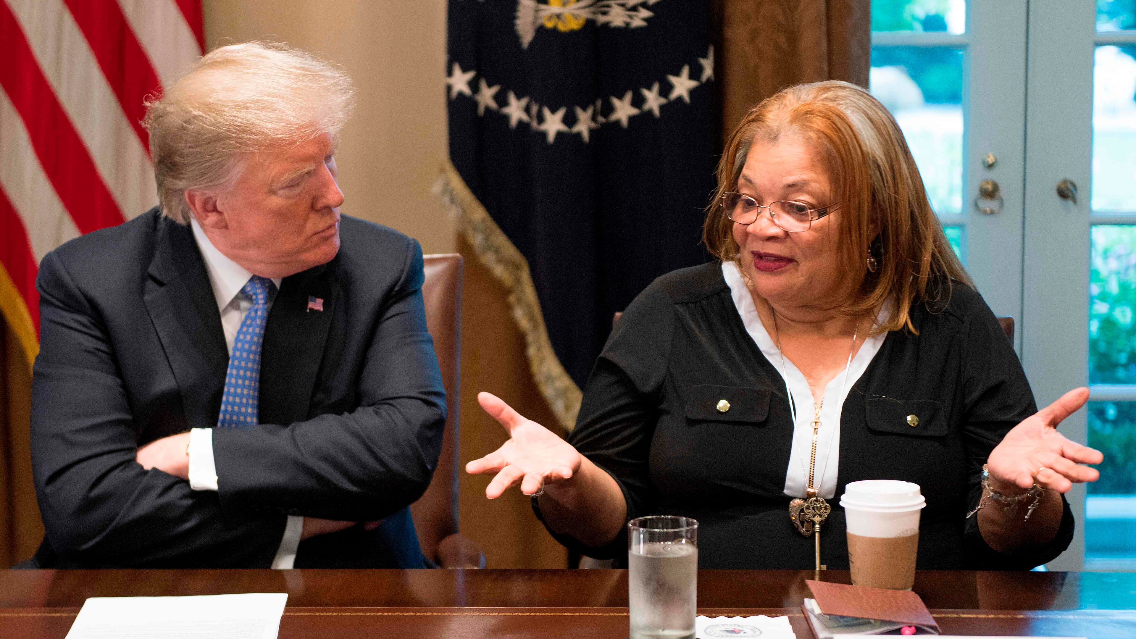 President Donald Trump listens to Alveda King, niece of Dr. Martin Luther King Jr., during a meeting with inner city pastors at the White House in 2018. King was also one of about 20 faith leaders who met with Trump this week.