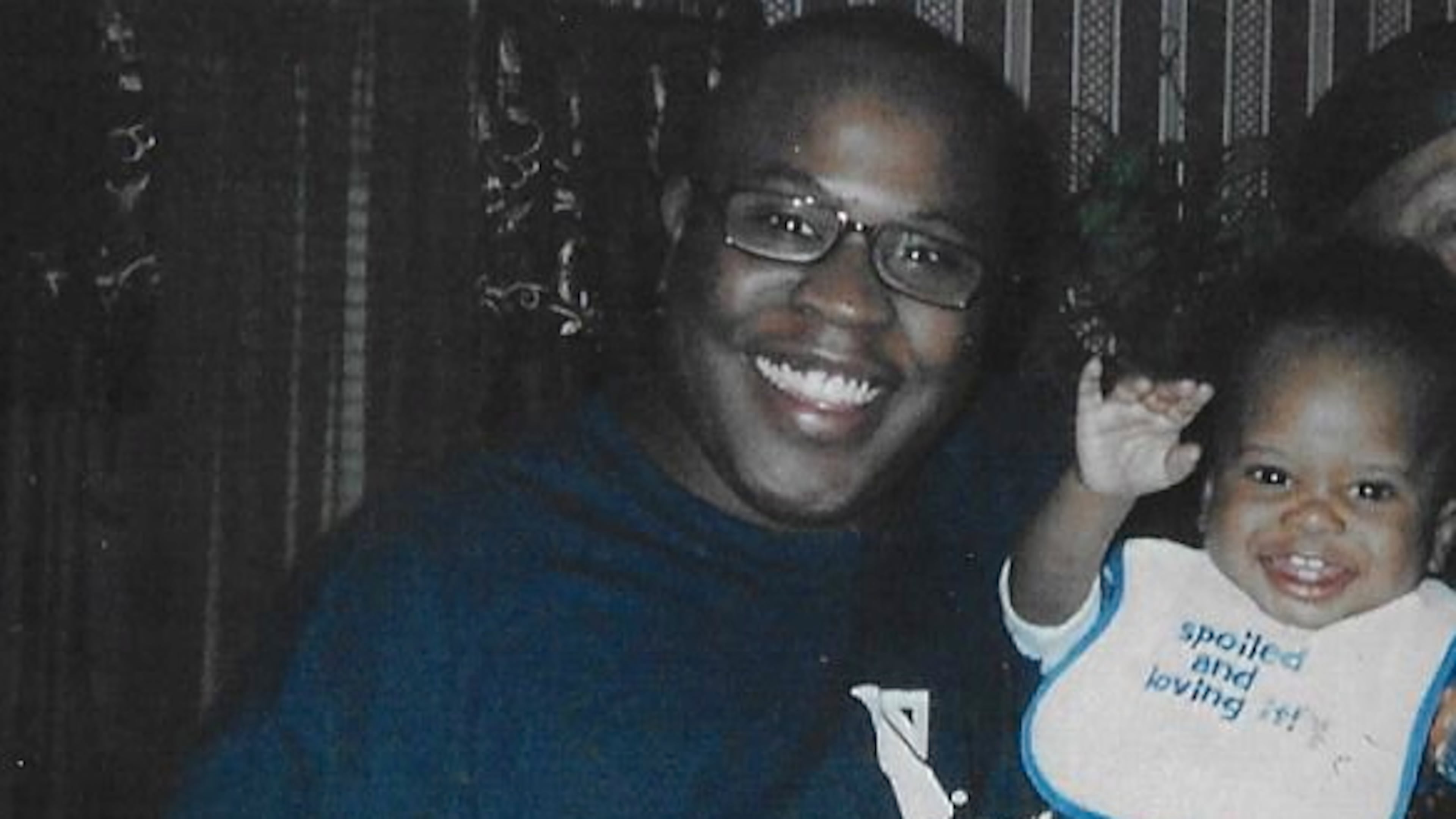 DeMontae Ware holds his nephew in this undated family photo.