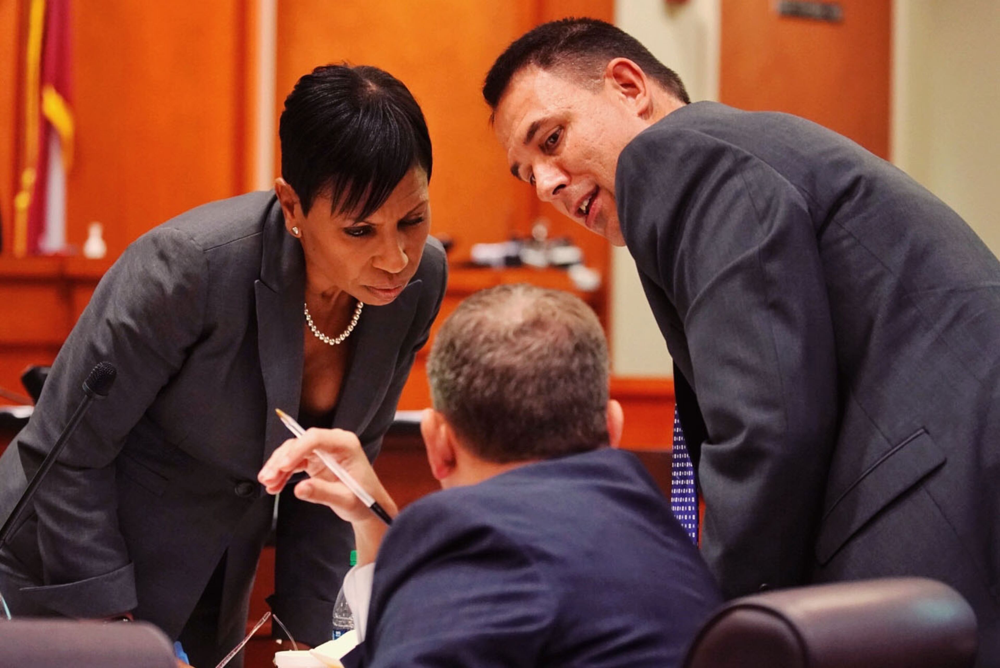 Lead prosecutor Buffy Thomas confers with fellow prosecuting attorneys Lance Cross and Pete Johnson during Day Three of the Robert Olson murder trial at the DeKalb County Courthouse on October 1, 2019 in Decatur. Olsen is charged with murdering war veteran Anthony Hill. (Elijah Nouvelage for The Atlanta Journal Constitution)