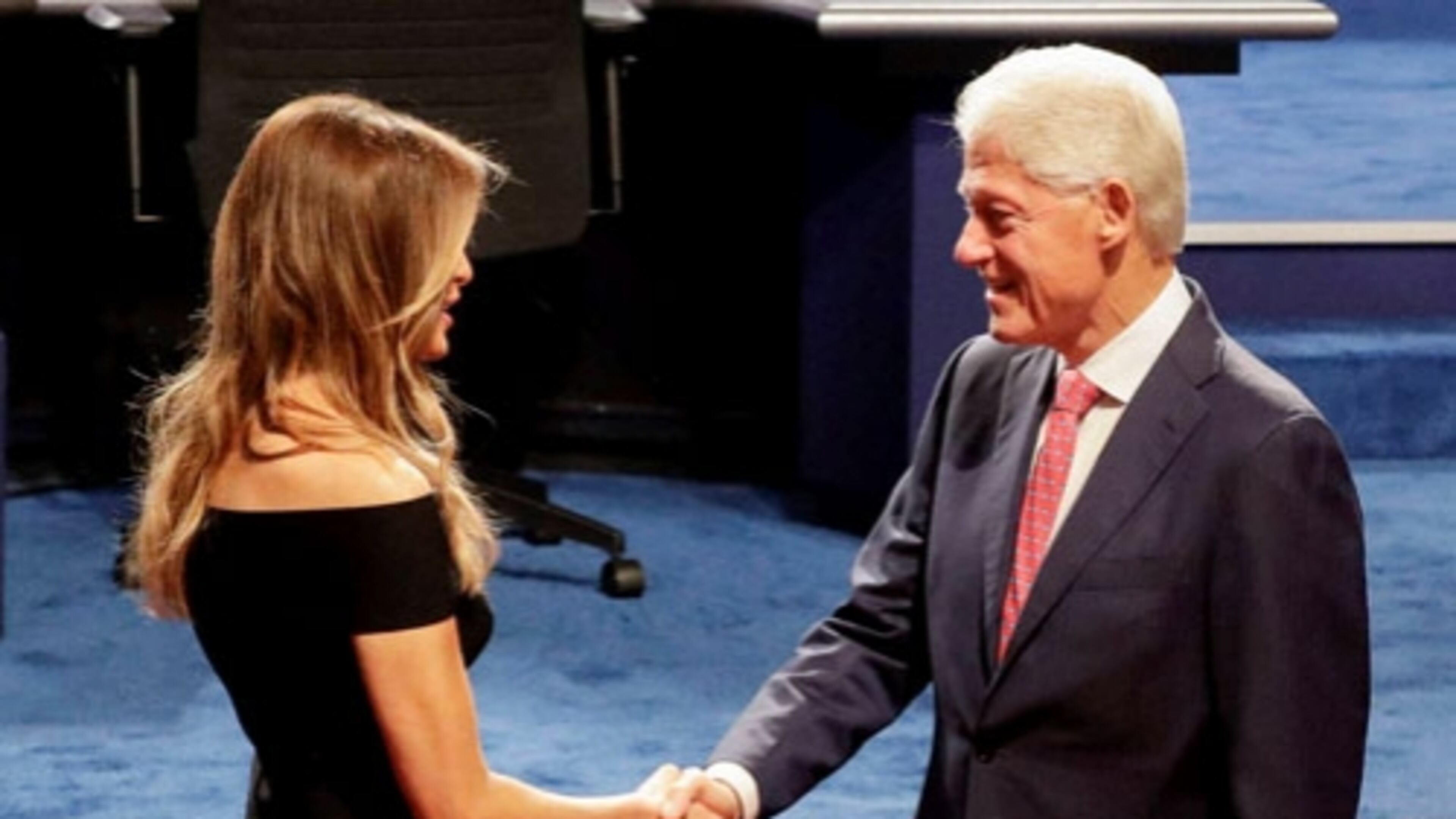 Former president Bill Clinton shakes hands with Melania Trump, wife of Donald Trump before the presidential debate at Hofstra University in Hempstead, N.Y., Monday, Sept. 26, 2016. AP file.
