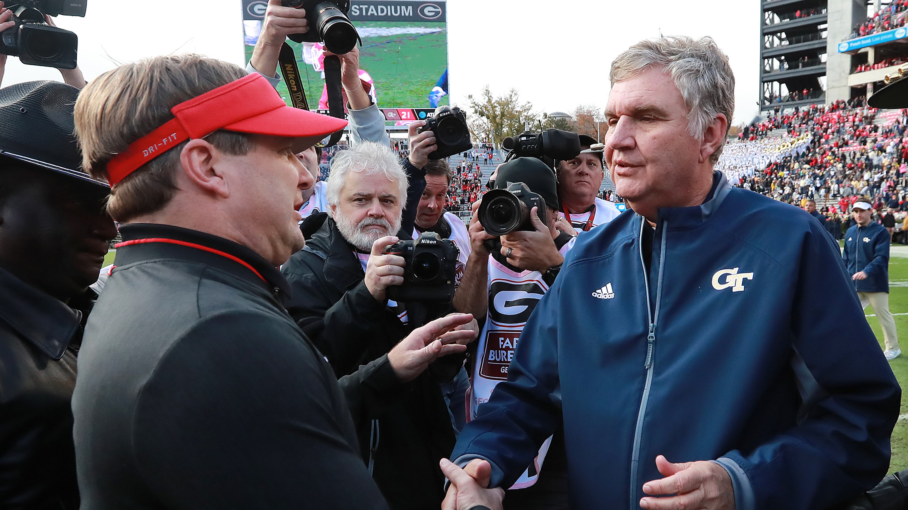 Nov 24, 2018 Athens: Georgia head coach Kirby Smart and Georgia Tech head coach Paul Johnson shake hands after Georgia defeated Georgia Tech 45-21 in their NCAA college football rivalry game on Saturday, Nov. 24, 2018, in Athens. Curtis Compton/ccompton@ajc.com