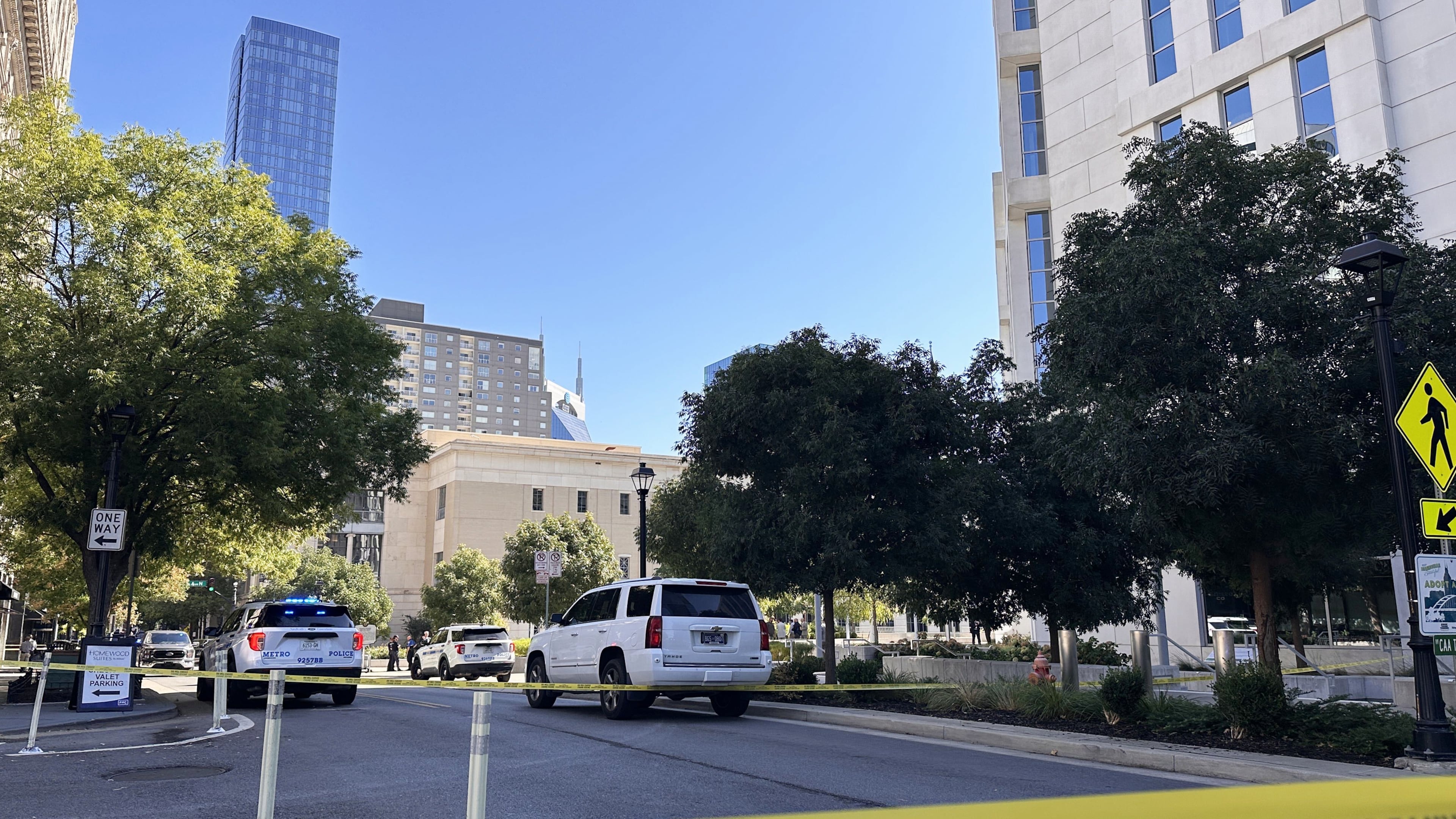 In this photo taken with a smartphone, law enforcement responds to a shooting at the federal courthouse, Thursday, Oct. 8, 2026, in Nashville, Tenn. (AP Photo/Kristin Hall)