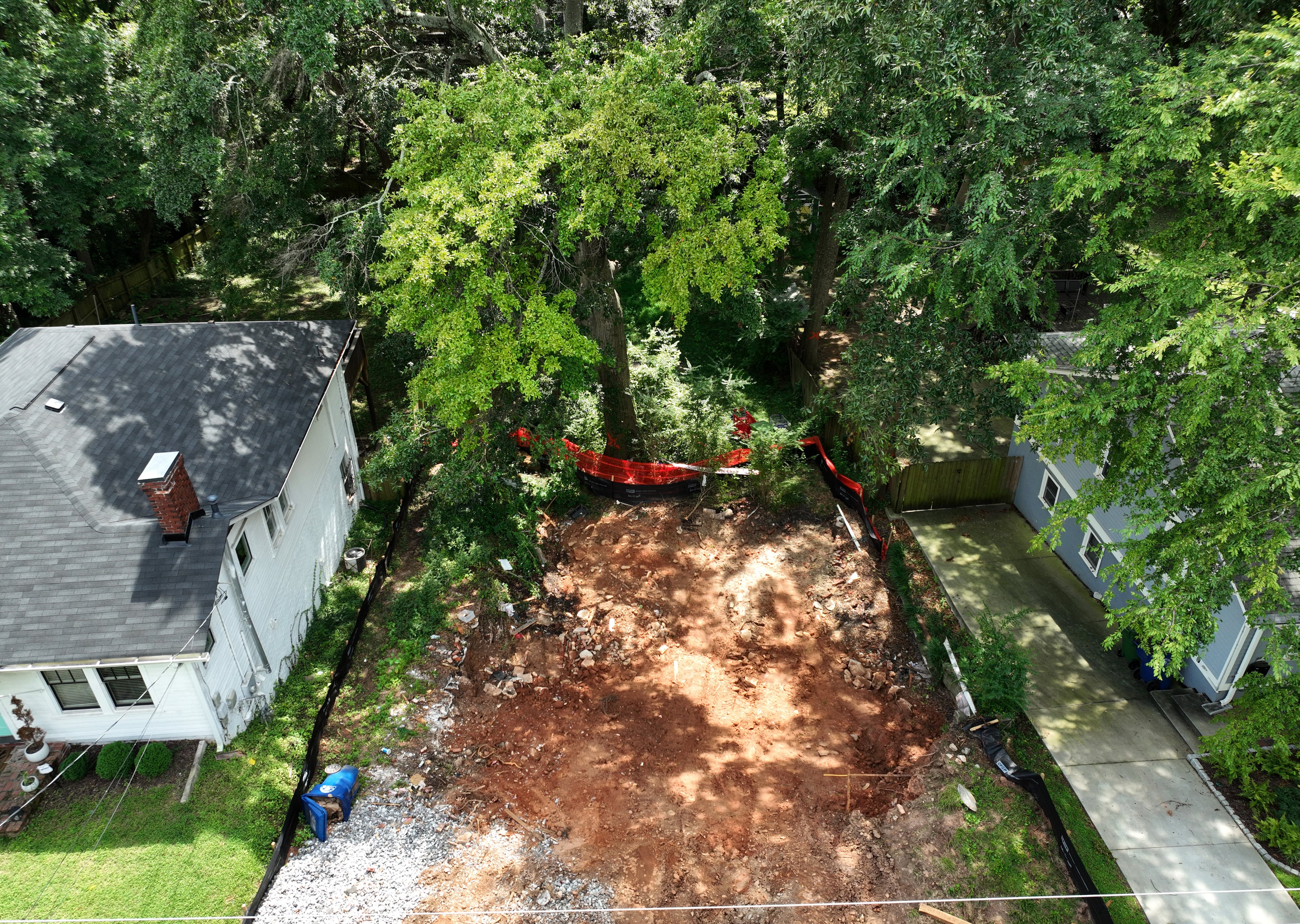 An aerial photo show a property with several trees marked for removal in Reynoldstown on Thursday, September 8, 2022. (Hyosub Shin/AJC)