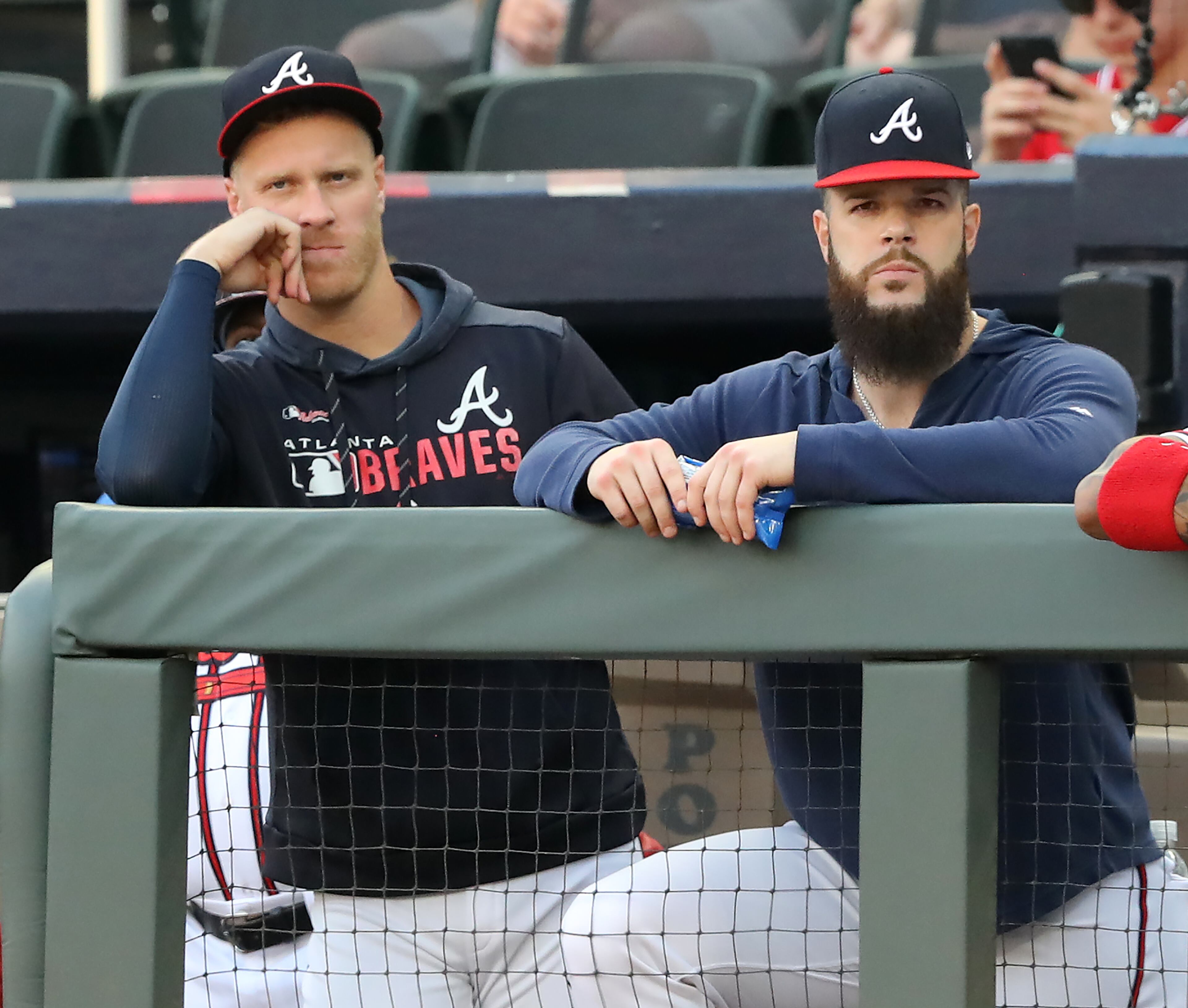 Braves pitchers Mike Foltynewicz (left) and Dallas Keuchel watch game action. Curtis Compton/ccompton@ajc.com