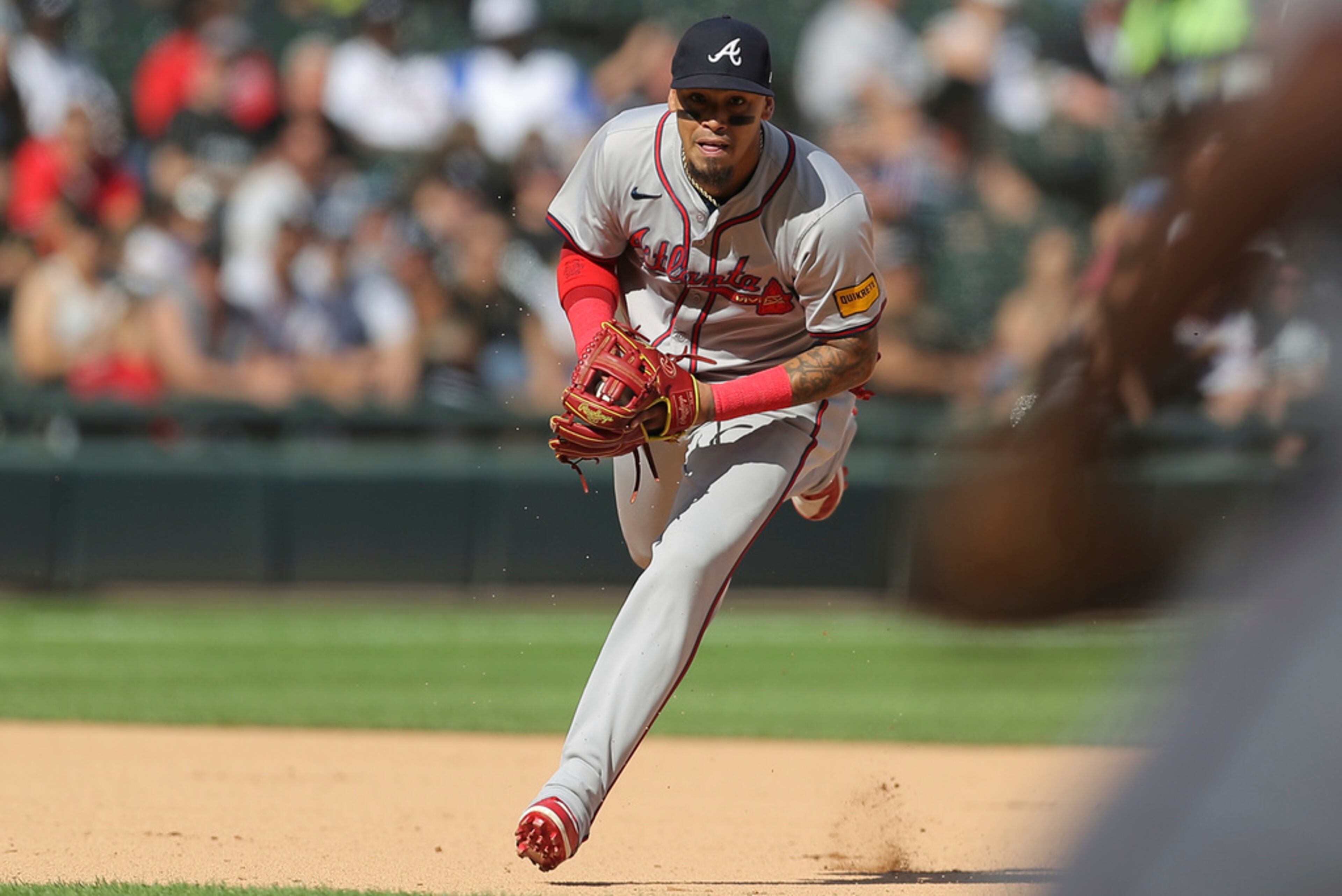 Atlanta Braves' Orlando Arcia fields the ball during the sixth inning of a baseball game against the Chicago White Sox, Thursday, June 27, 2024, in Chicago. (AP Photo/Melissa Tamez)