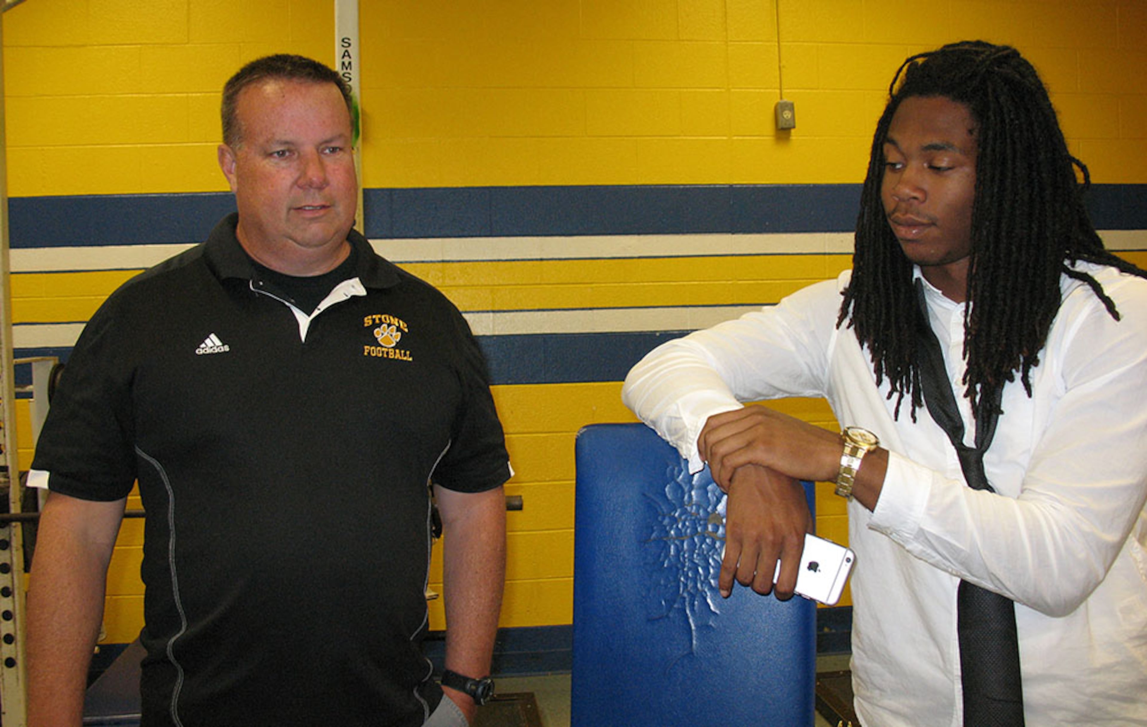Coach Paul Friel's arrival at Stone in 2012 represented another turnaround for Briscoe. Friel, who coached at Johnson High in Gainsville before relocating to Maryland, showcased Briscoe's speed as the featured back in his run-oriented offense, which helped propel the Cougars to a region championship in 2014. Friel also made sure Briscoe's highlights got in front of the eyes of recruiters, which led to Georgia, Ohio State, Oklahoma, Penn State and Clemson all clamoring for his favor. (AJC / CHIP TOWERS)