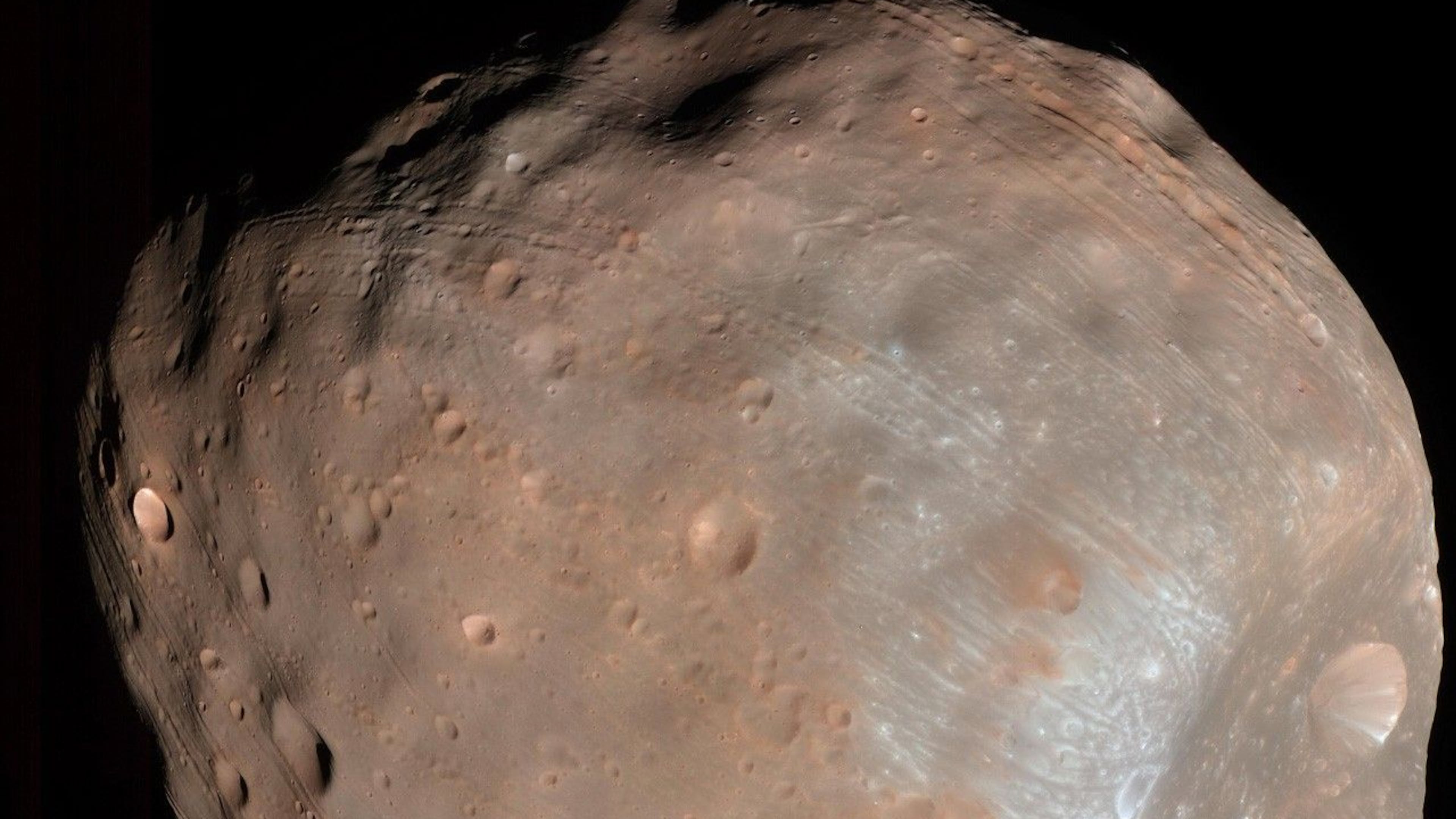 This photo provided by NASA/JPL-Caltech/University of Arizona, taken with NASA's Mars Reconnaissance Orbiter, shows Phobos, one of Mars' moons, on March 23, 2008. (NASA/JPL-Caltech/University of Arizona via AP)