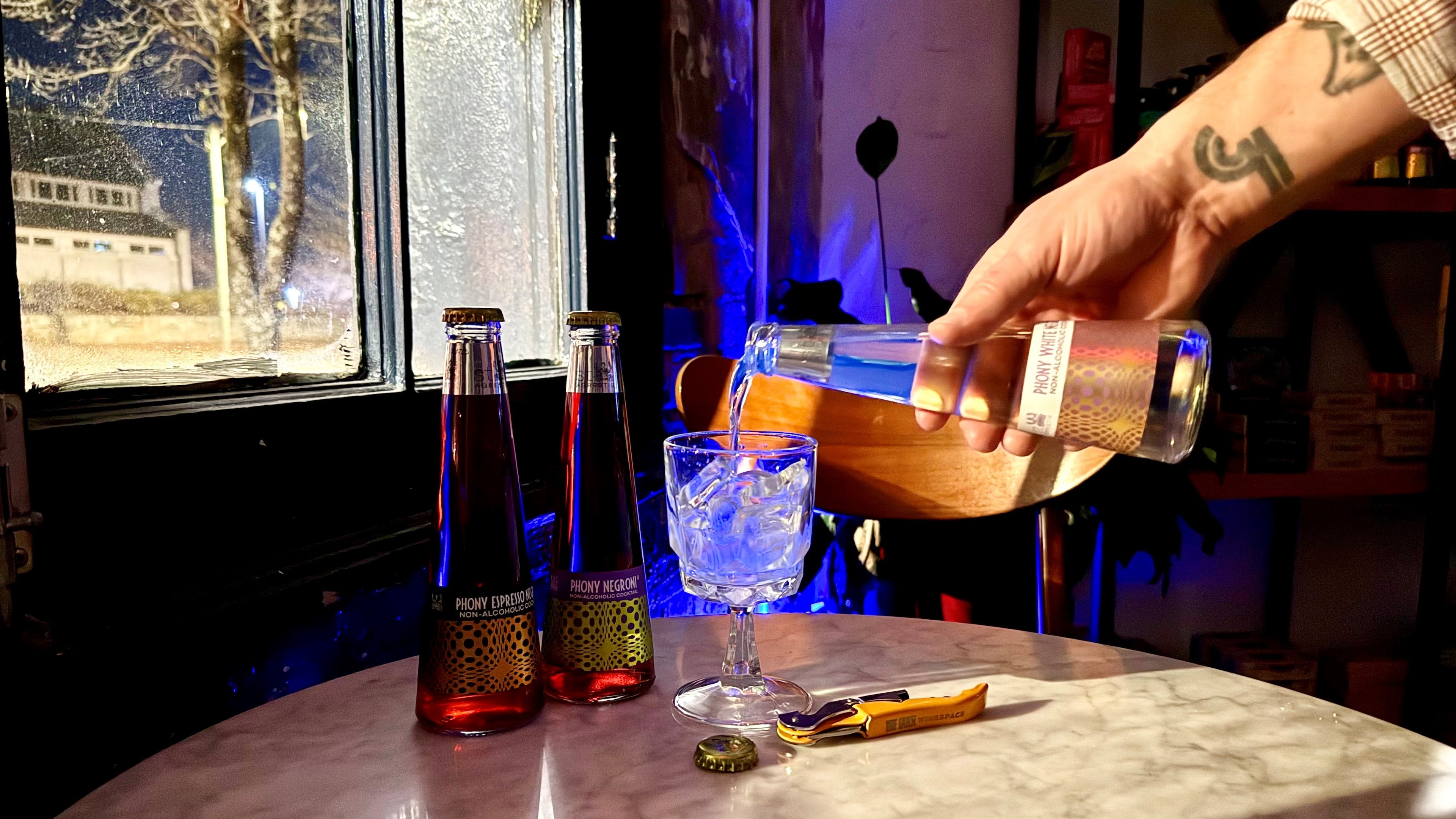 Non-alcoholic cocktails, like this Phony White Negroni from St. Agrestis, are here to stay in 2026, according to columnists Jerry and Krista Slater. (Krista Slater for the AJC)