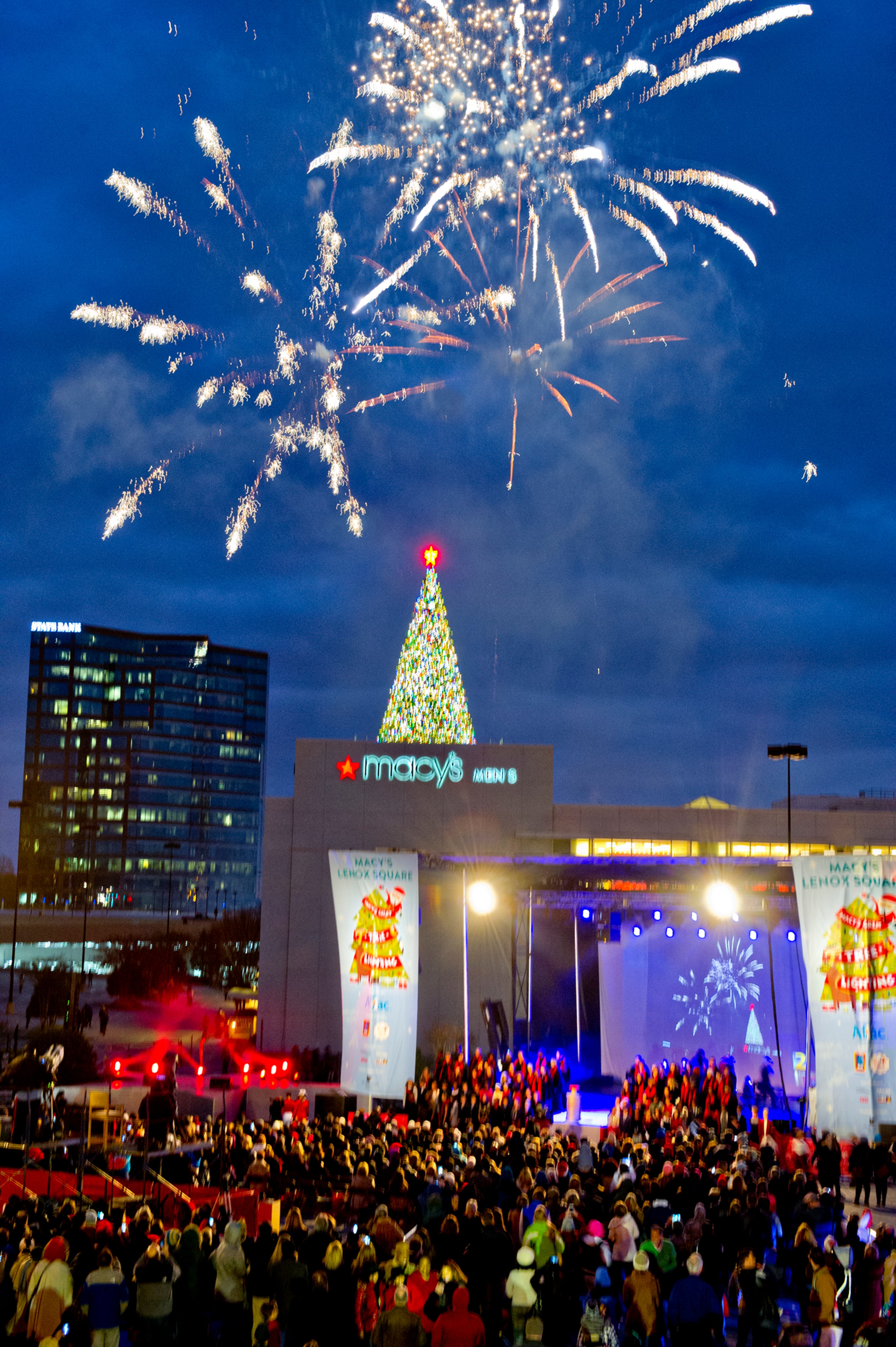 Fireworks go off above the Christmas tree on top of the Macy's building at Lenox Square Mall in Atlanta during the annual tree lighting ceremony on Thursday, Nov. 27, 2014. Thousands of people came out to watch the show which featured performances by The Isley Brothers, Pentatonix, tenor Timothy Miller and many more. JONATHAN PHILLIPS / SPECIAL