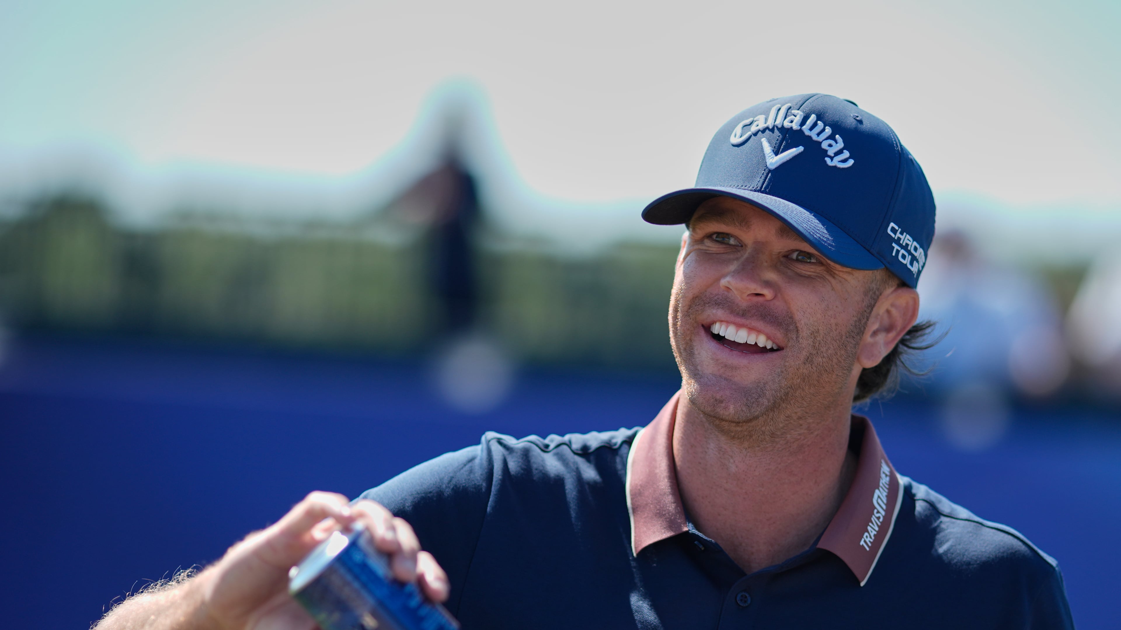Marcus Plunkett of the United States fills his water bottle on the 15th hole during a practice round for the British Open Golf championships at Royal Birkdale golf club, in Southport, England, Tuesday, July 14, 2026. (AP Photo/David Goldman)
