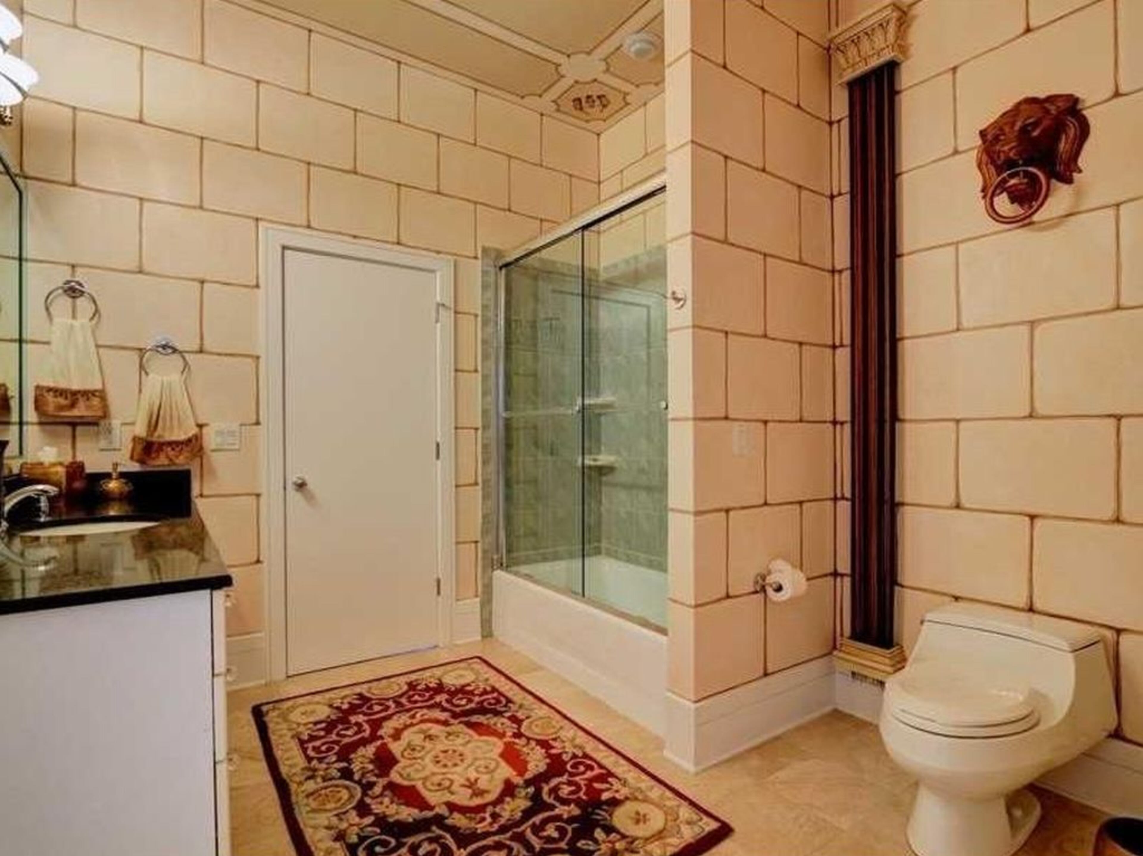 This Marietta mansion spans 8,104 square feet and comes with six bedrooms and five-and-a-half bathrooms, according to the listing on Zillow.com.