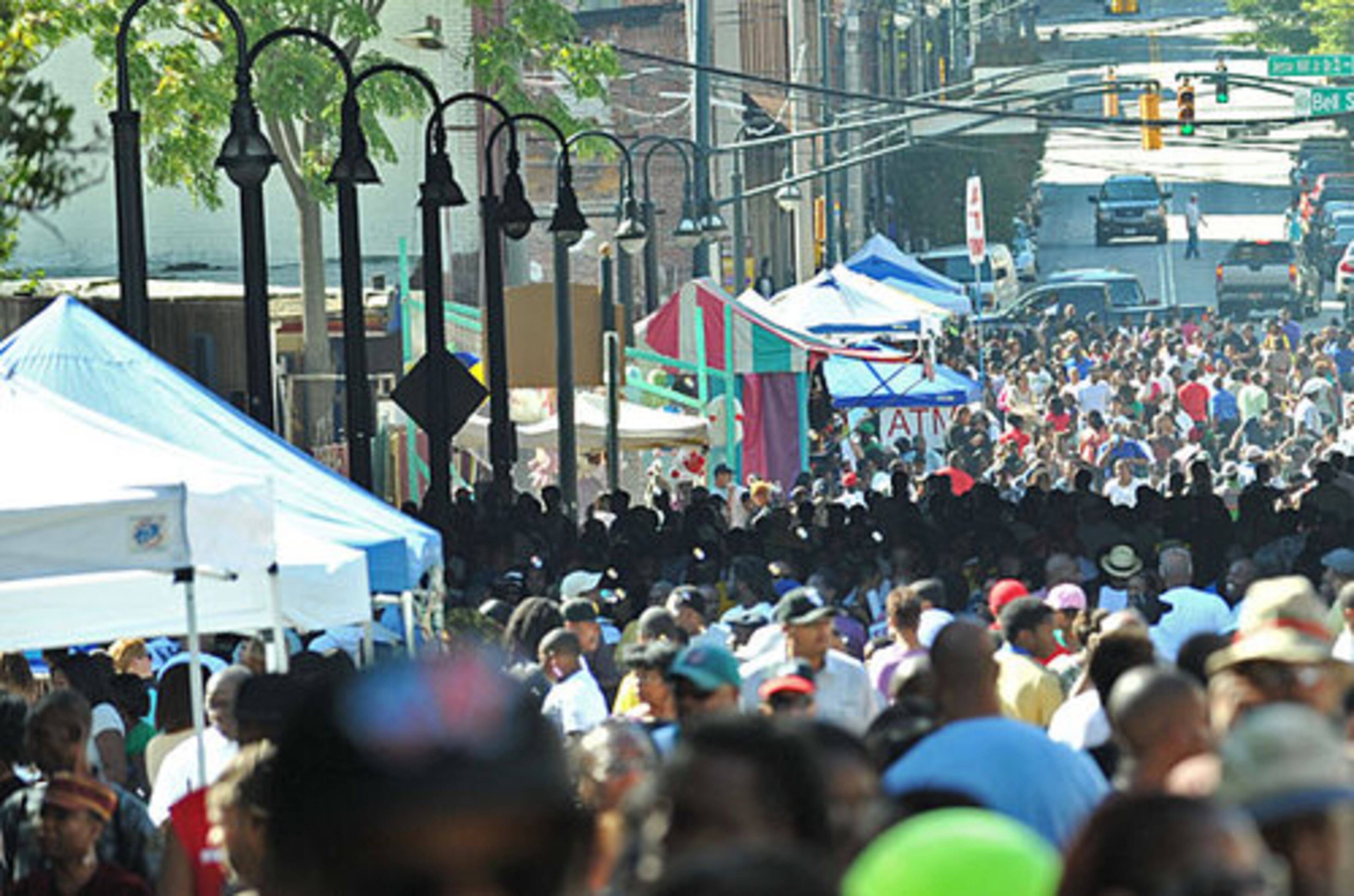 Thousands of people attend the Sweet Auburn Heritage Festival on Historic Auburn Avenue in Atlanta on Saturday, Oct. 9, 2010. The Sweet Auburn festival is the largest street festival in the Southeast traditionally attracting thousands of attendees.