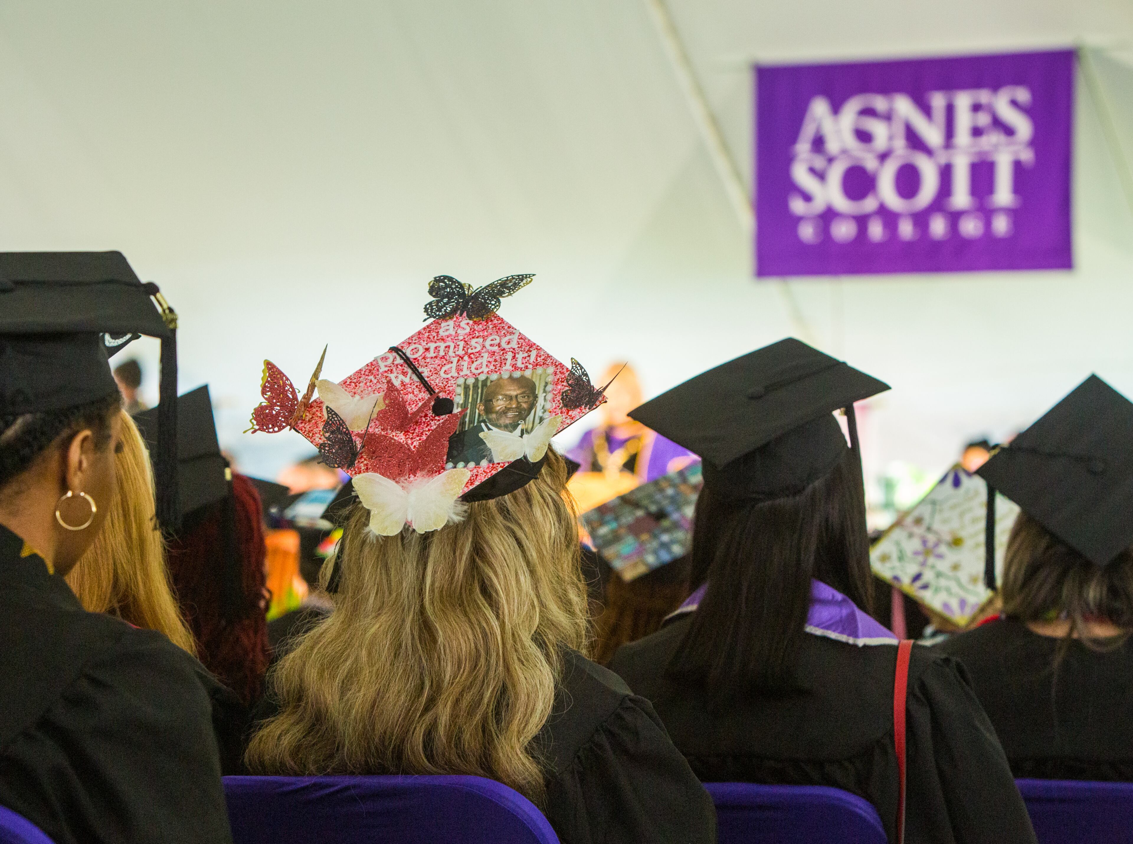 Agnes Scott College holds their graduation ceremony on Saturday, May 14, 2022 with actress and singer Saycon Sengbloh delivering the commencement address to the college’s largest graduating class of 282 graduates. Val’Dazia Todd’s mortarboard honors her grandfather. (Jenni Girtman for The Atlanta Journal-Constitution)