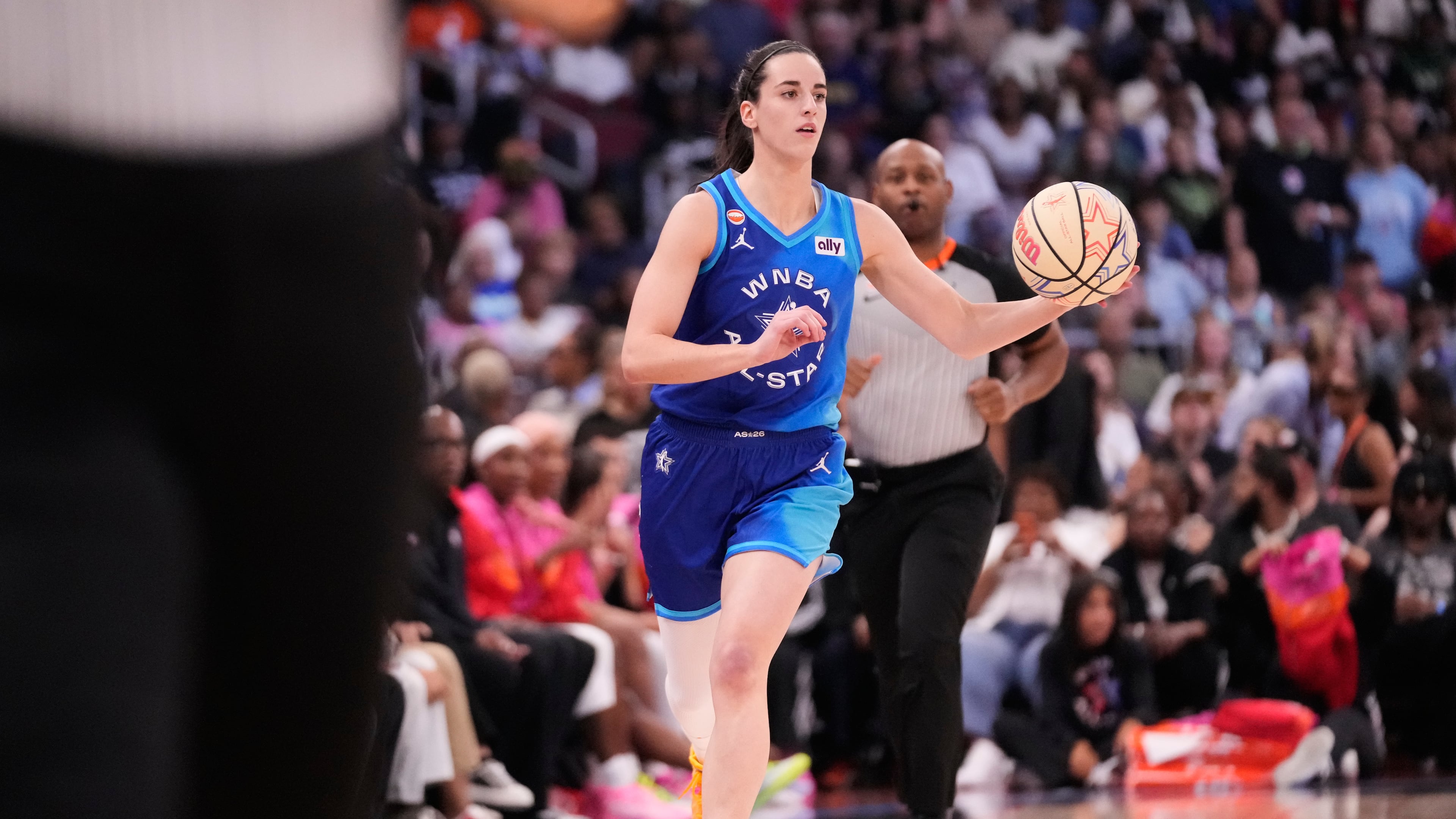 Team Spoon's Caitlin Clark looks to pass the ball during the first half of a WNBA All-Star basketball game against Team Coop in Chicago, Saturday, July 25, 2026. (AP Photo/Nam Y. Huh)