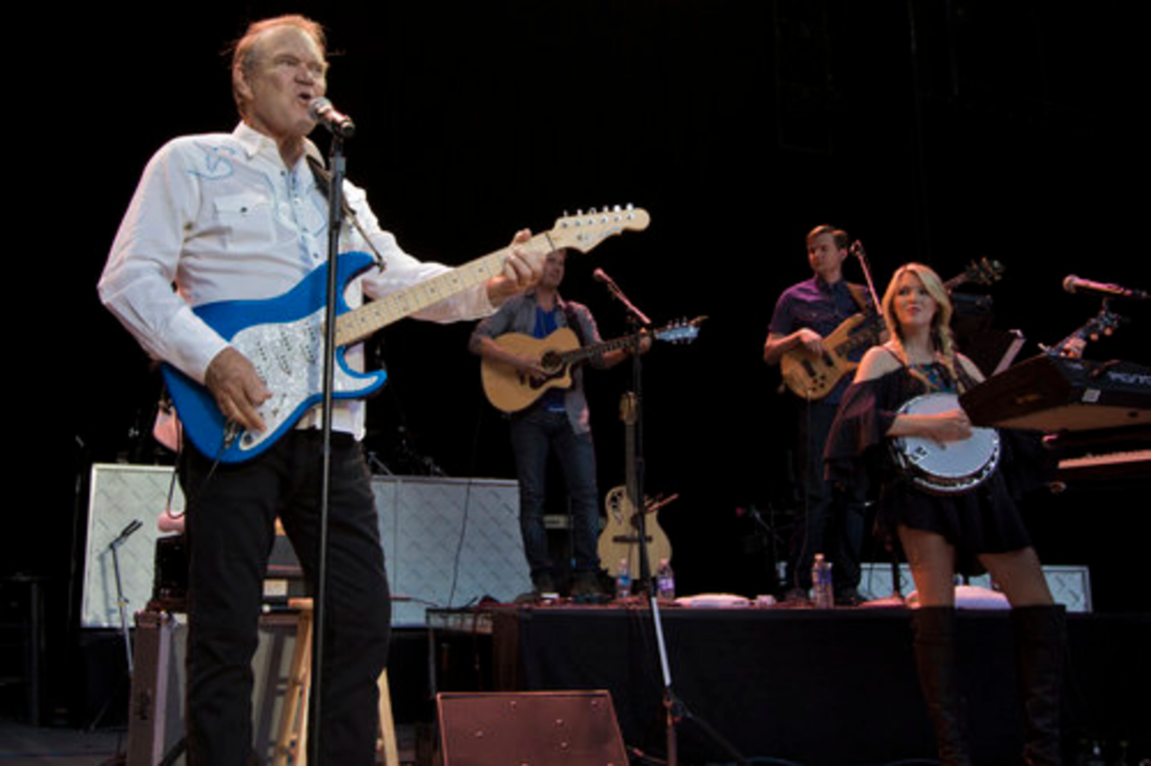 Glen Campbell shows off guitar riffs during the early part of his opening set.