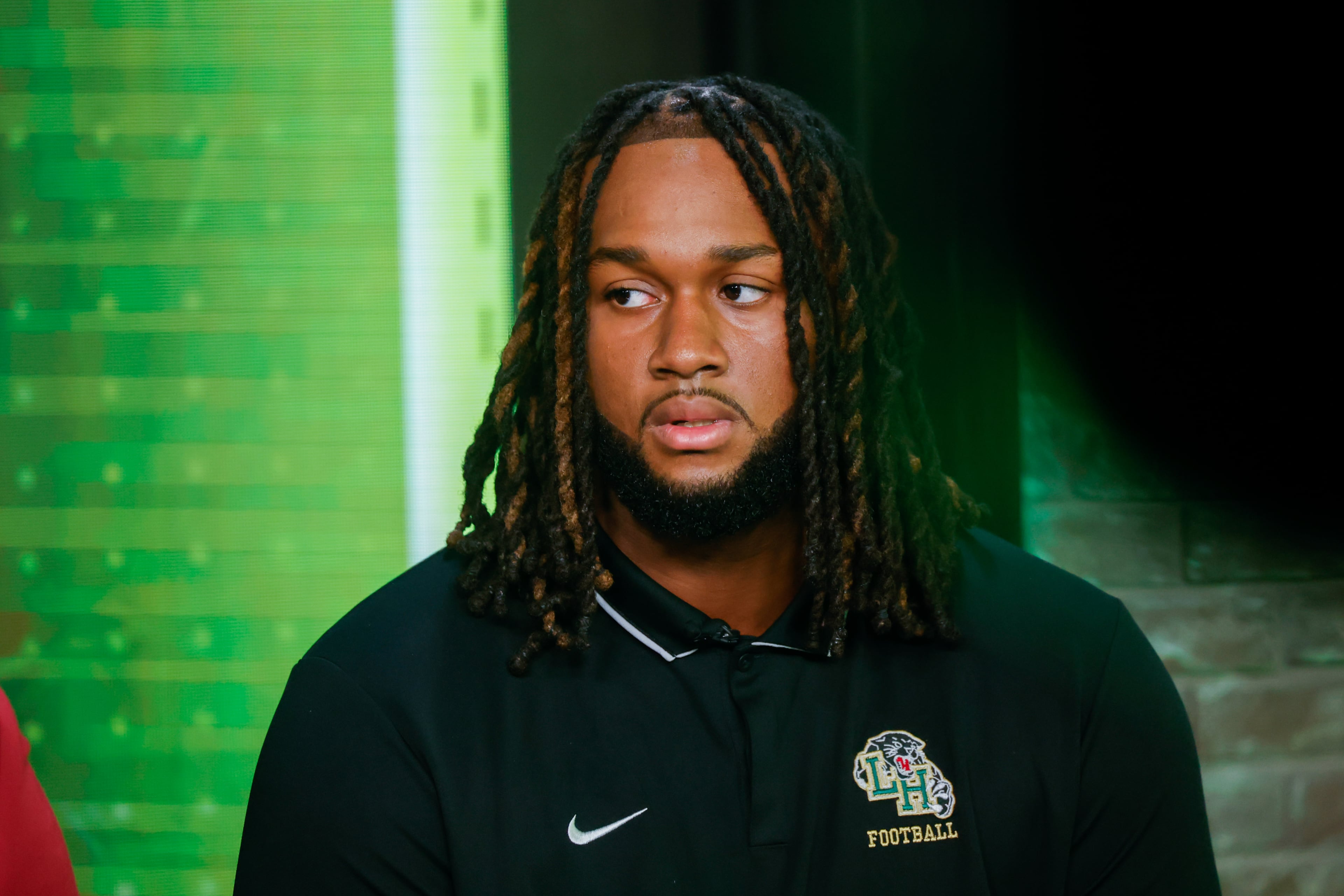 Hughes’ Kelsey Adams Jr. appears during the taping of the Super 11 reveal show at Score ATL in Roswell on Aug. 3, 2026. (Arvin Temkar/AJC)