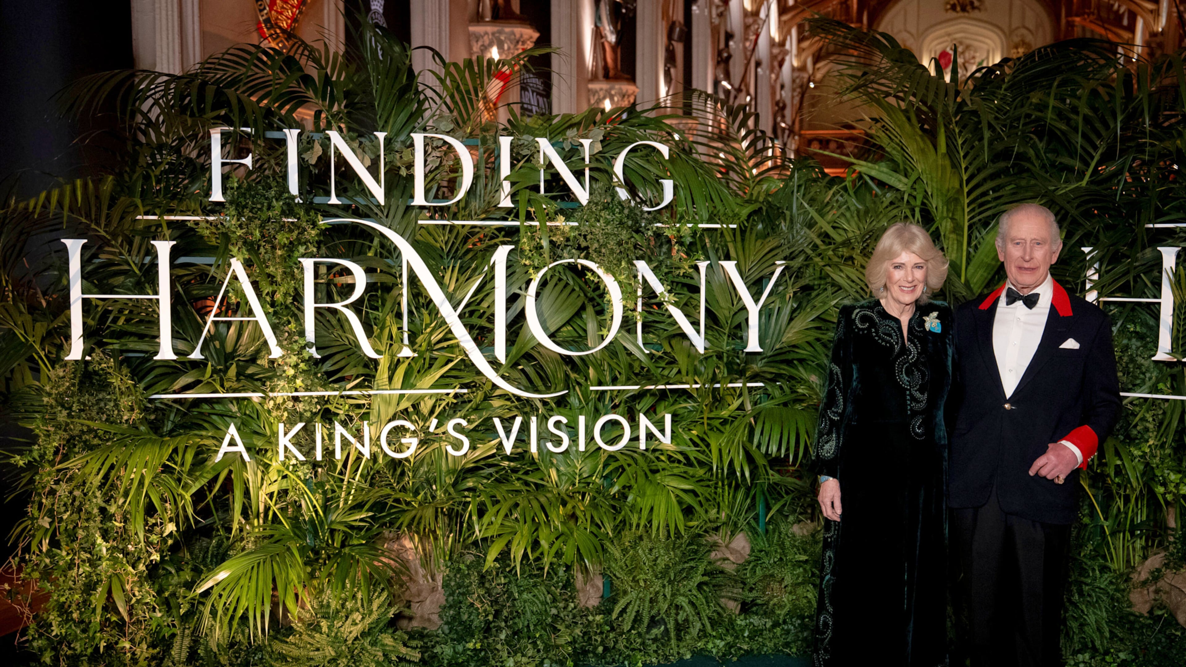 Britain's King Charles III and Queen Camilla attend the premiere of Finding Harmony: A King's Vision, at Windsor Castle in Berkshire, England, Wednesday, Jan. 28, 2026. (Aaron Chown/PA via AP)