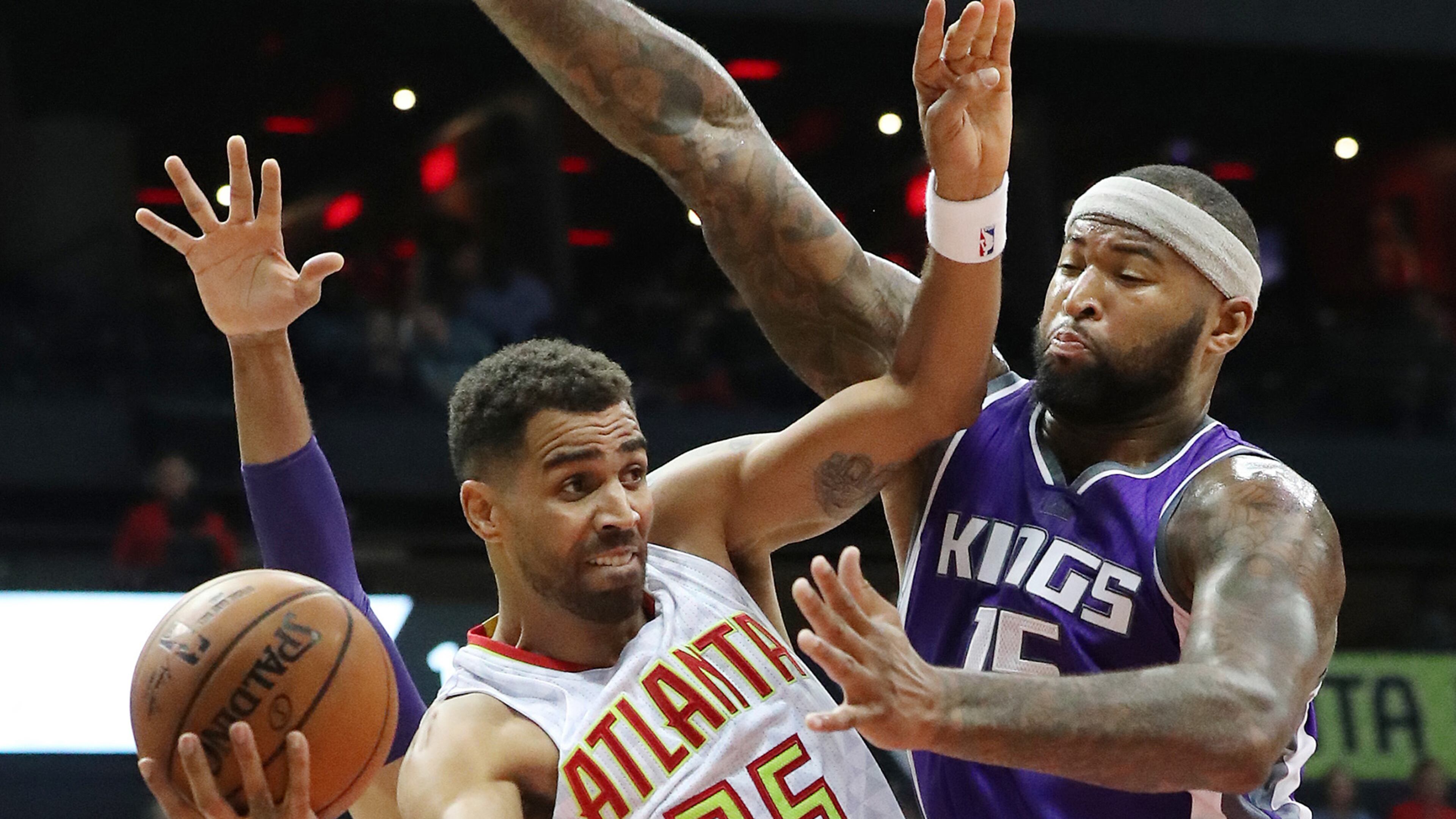 October 31, 2016 ATLANTA: Kings DeMarcus Cousins defends against Hawks Thabo Sefolosha under the basket during the second period in an NBA basketball game on Monday, Oct. 31, 2016, in Atlanta. Curtis Compton /ccompton@ajc.com