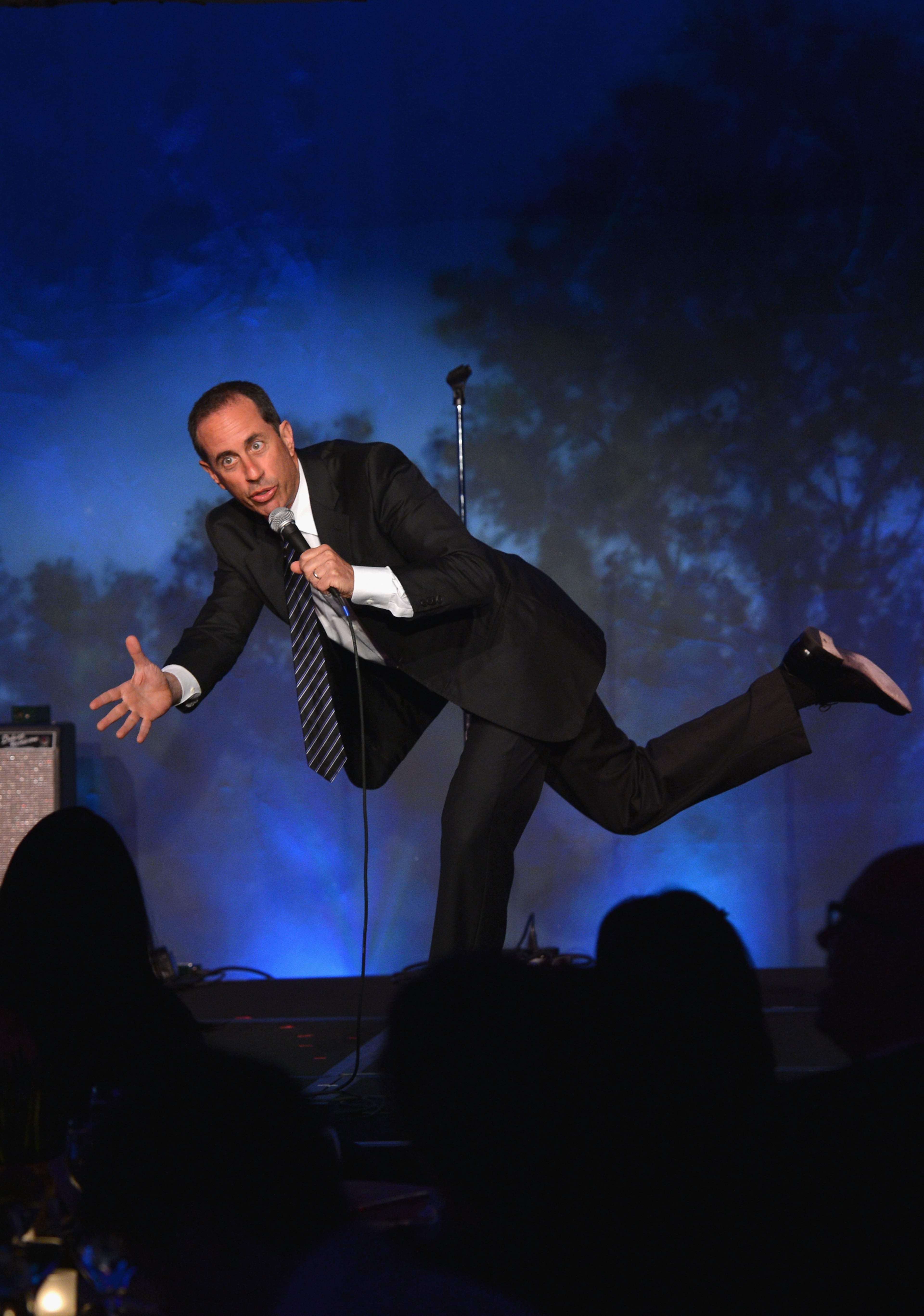 Comedian Jerry Seinfeld preforms during SeriousFun Children's Network event honoring Liz Robbins with celebrity guests at Pier Sixty at Chelsea Piers on April 4, 2013 in New York City. (Photo by Larry Busacca/Getty Images for SeriousFun Children's Network)