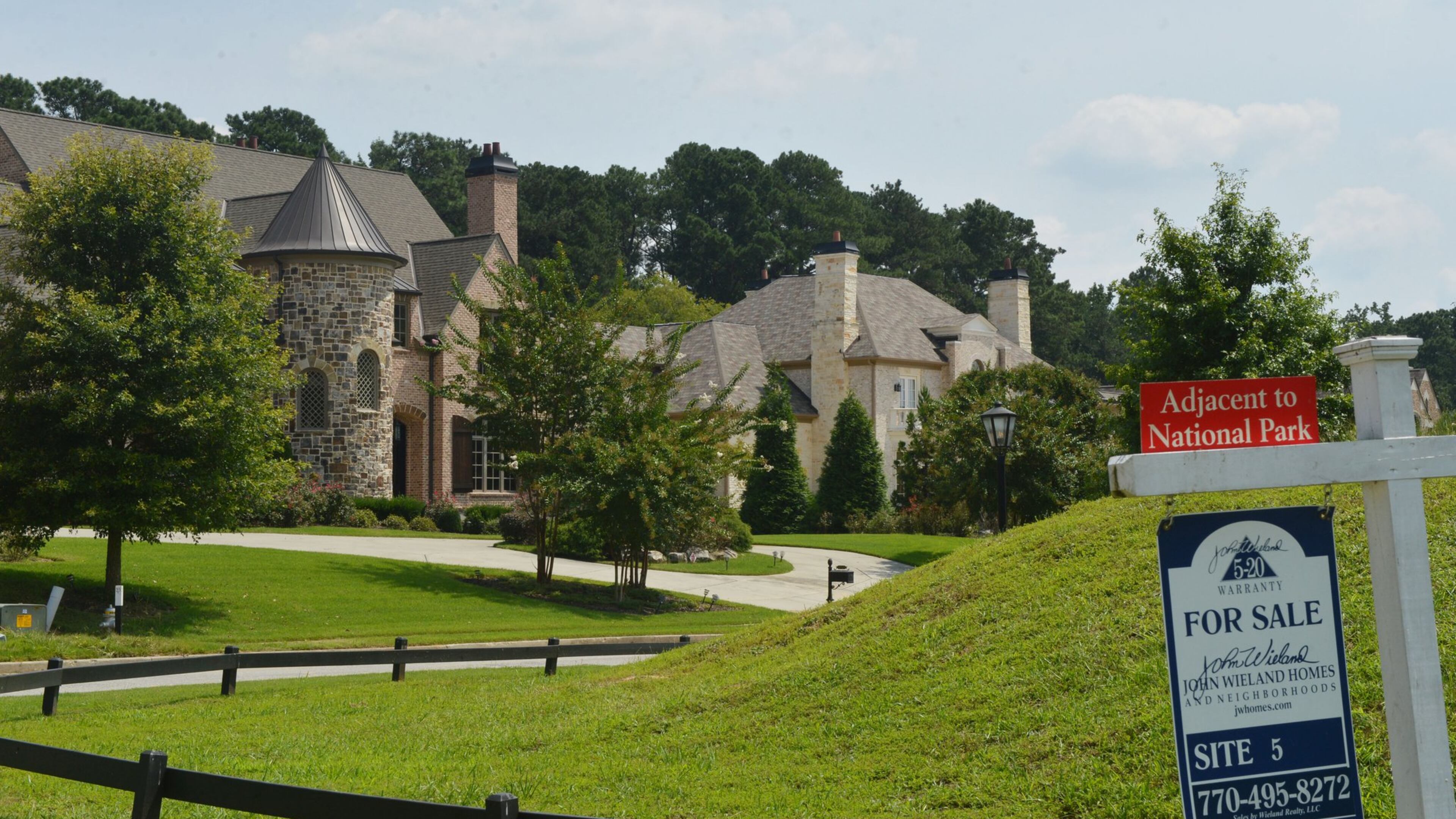 Homes in the Olde Taylor Farms subdivision in Johns Creek. Fulton County commissioners may raise property taxes. KENT D. JOHNSON / AJC FILE PHOTO