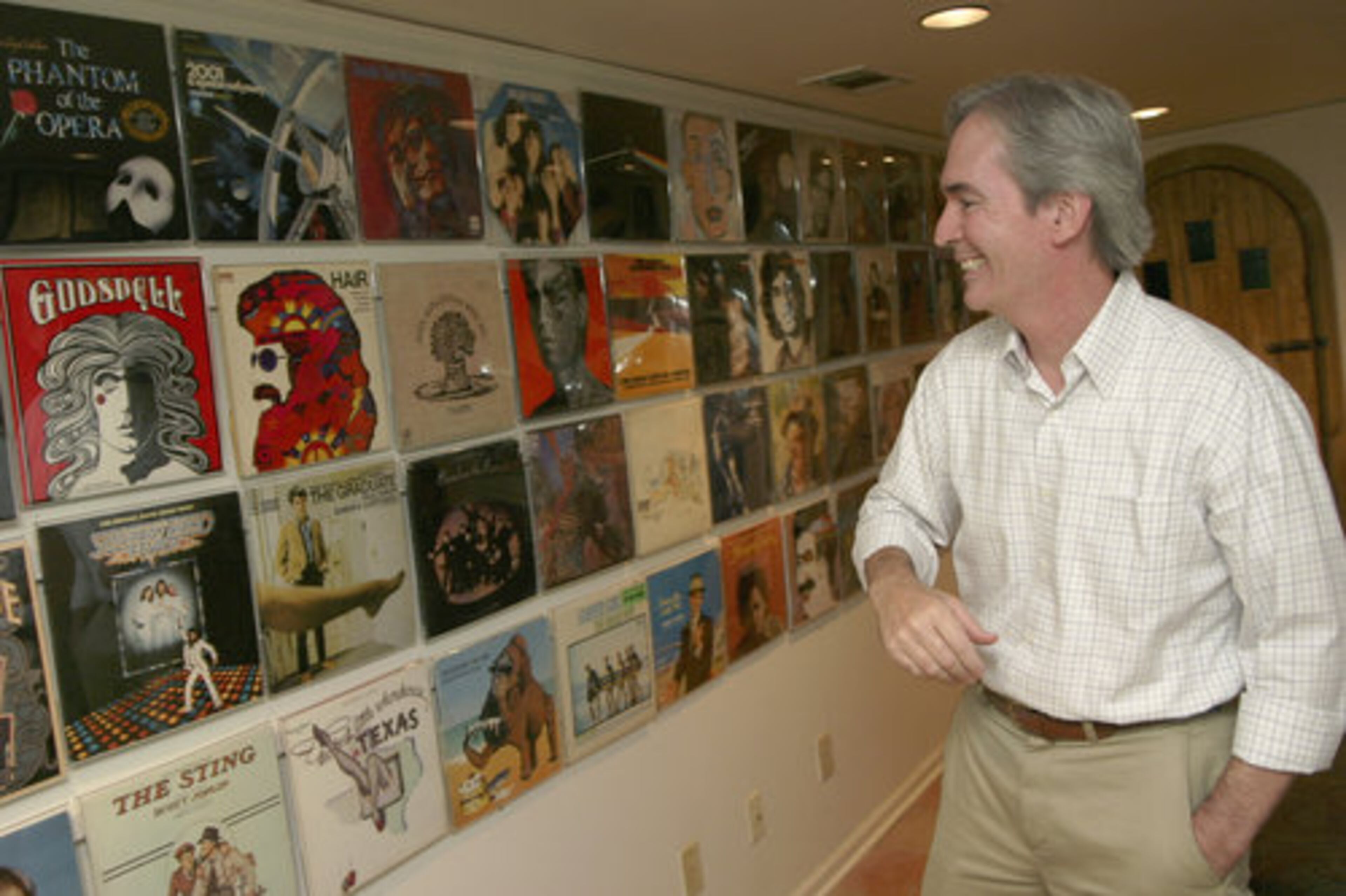 Robert gets to exercise his design sensibilities in the spare room on the lower level of the home. He has draped one wall of this guest room with his collection of album covers that span roughly four decades and several genres, including disco, rock 'n roll and Broadway musical.